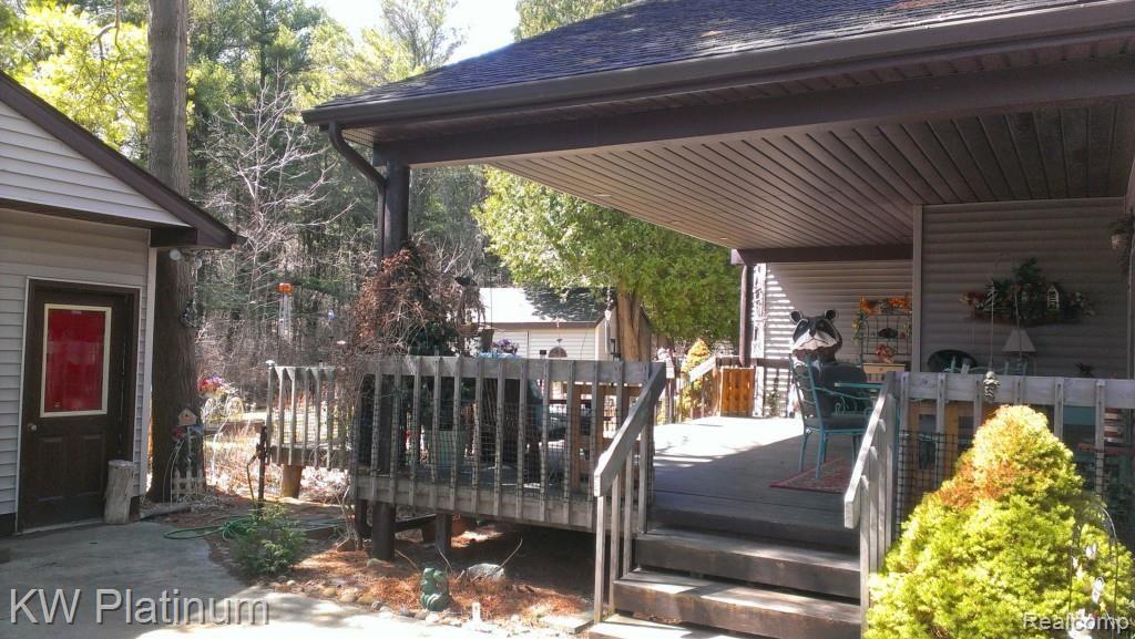 7230 Harrington Road Lexington, MI 48450 - Photo 5 of 46 Ext deck off drive way.jpg