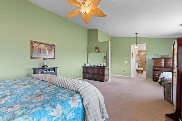 a bathroom with a sink double vanity mirror and a bathtub