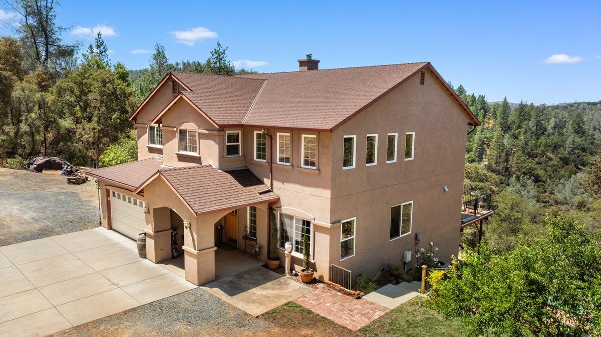 23392 Meyer Ravine Road Grass Valley, CA 95949 - Photo 7 of 58 a aerial view of a house with a yard