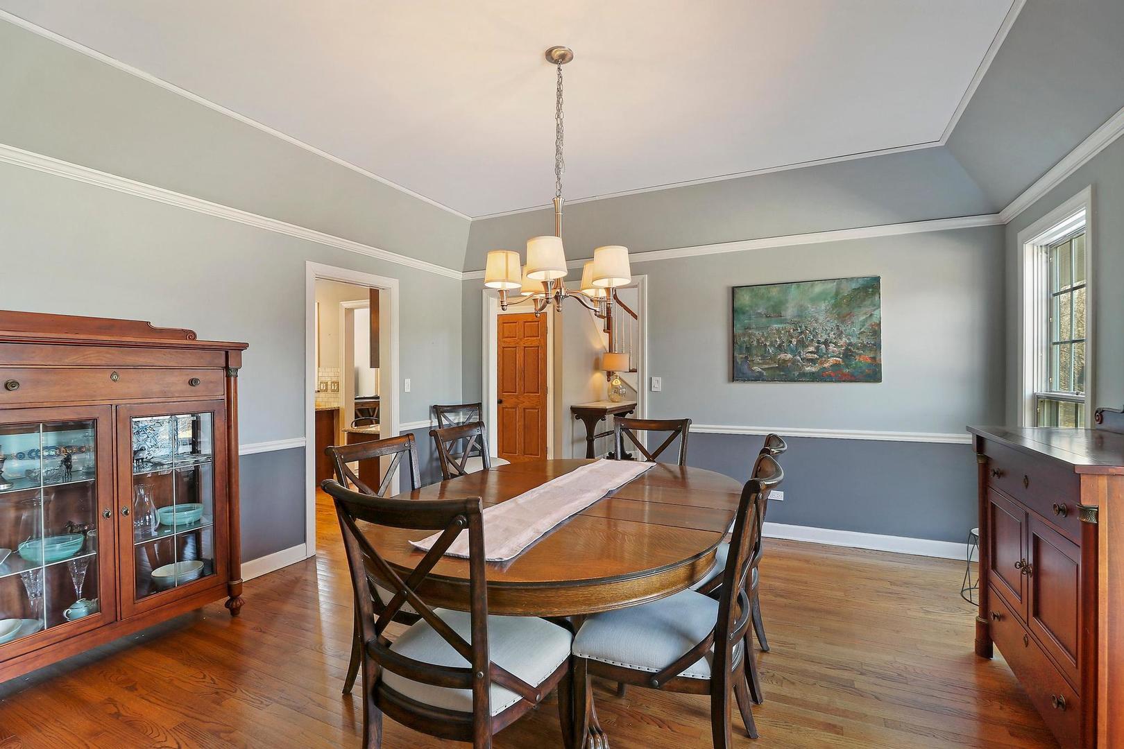 159 Helm Road Barrington Hills, IL 60010 - Photo 20 of 57 a view of a dining room with furniture window and wooden floor