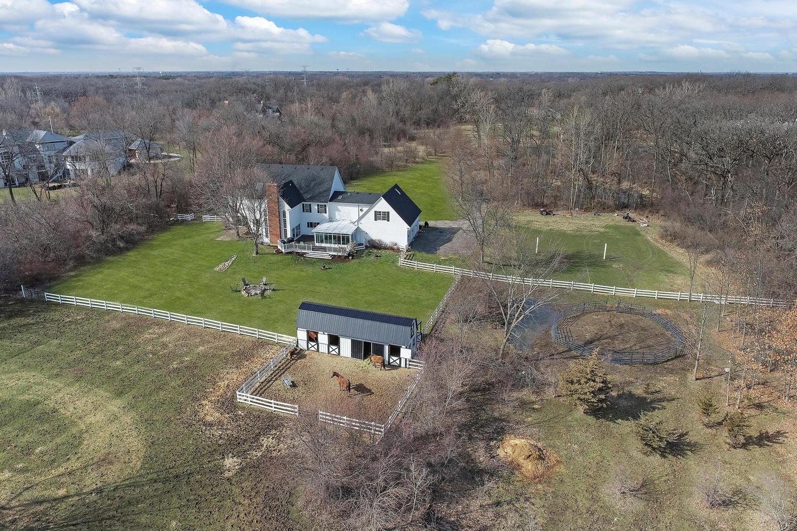 159 Helm Road Barrington Hills, IL 60010 - Photo 2 of 57 an aerial view of a house with a yard