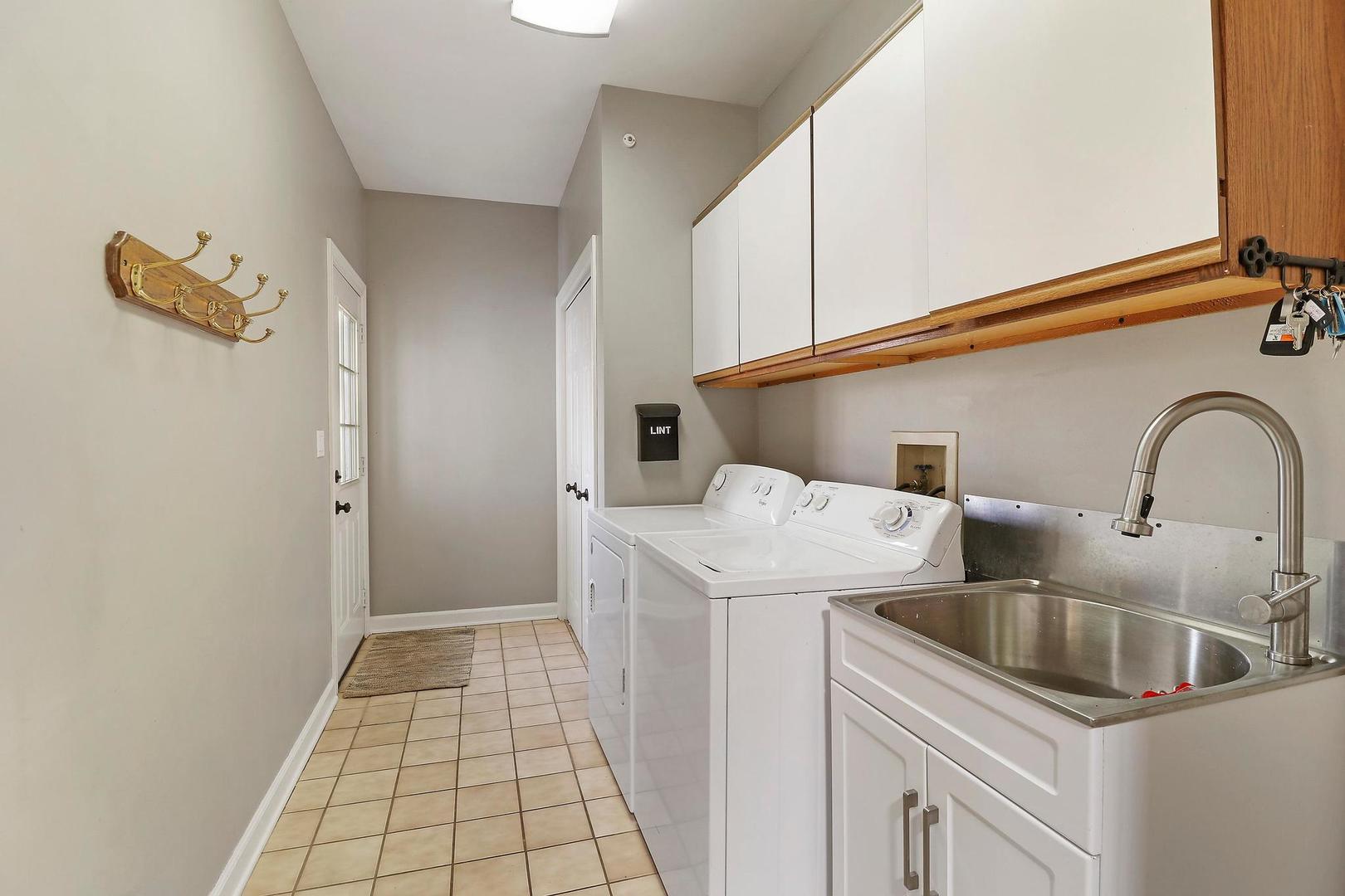 159 Helm Road Barrington Hills, IL 60010 - Photo 28 of 57 a utility room with dryer and washer