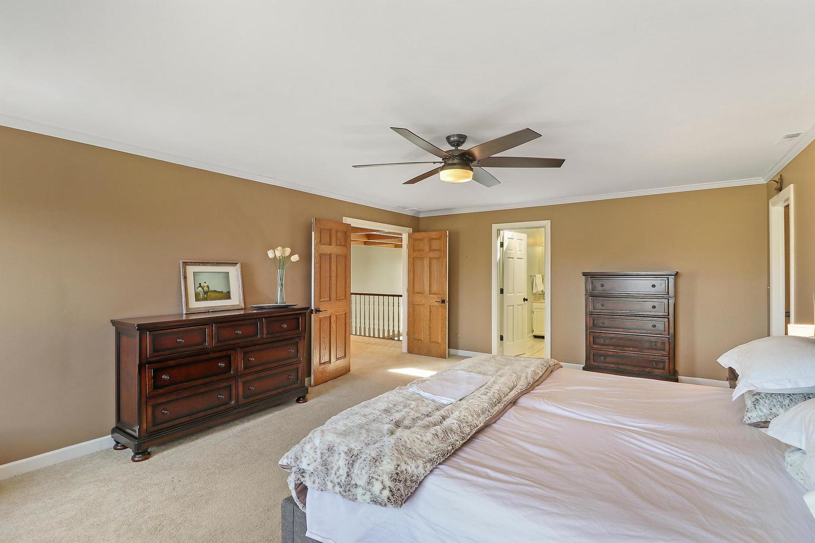 159 Helm Road Barrington Hills, IL 60010 - Photo 32 of 57 a bedroom with a bed and a dresser