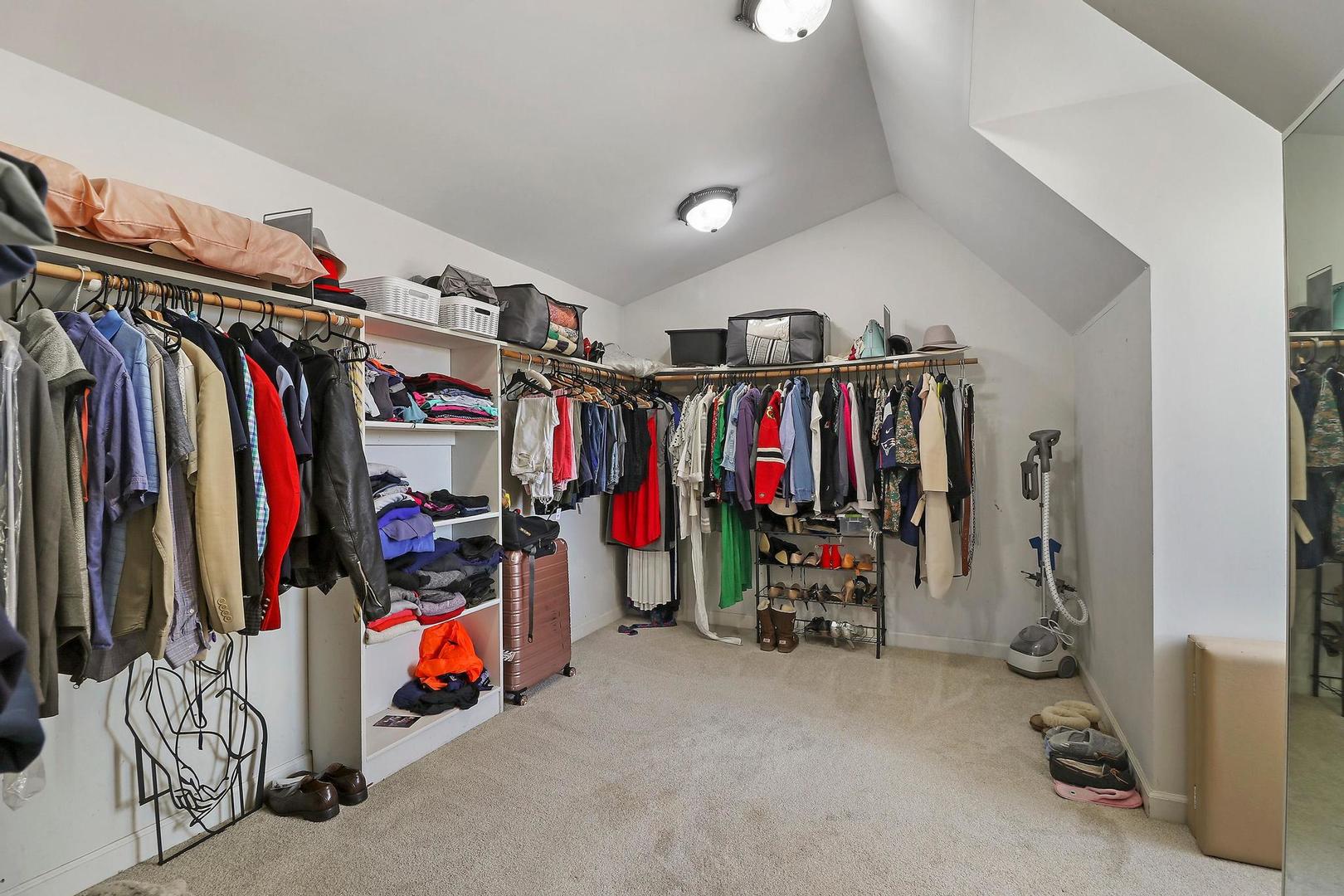 159 Helm Road Barrington Hills, IL 60010 - Photo 33 of 57 a view of walk in closet with clothes