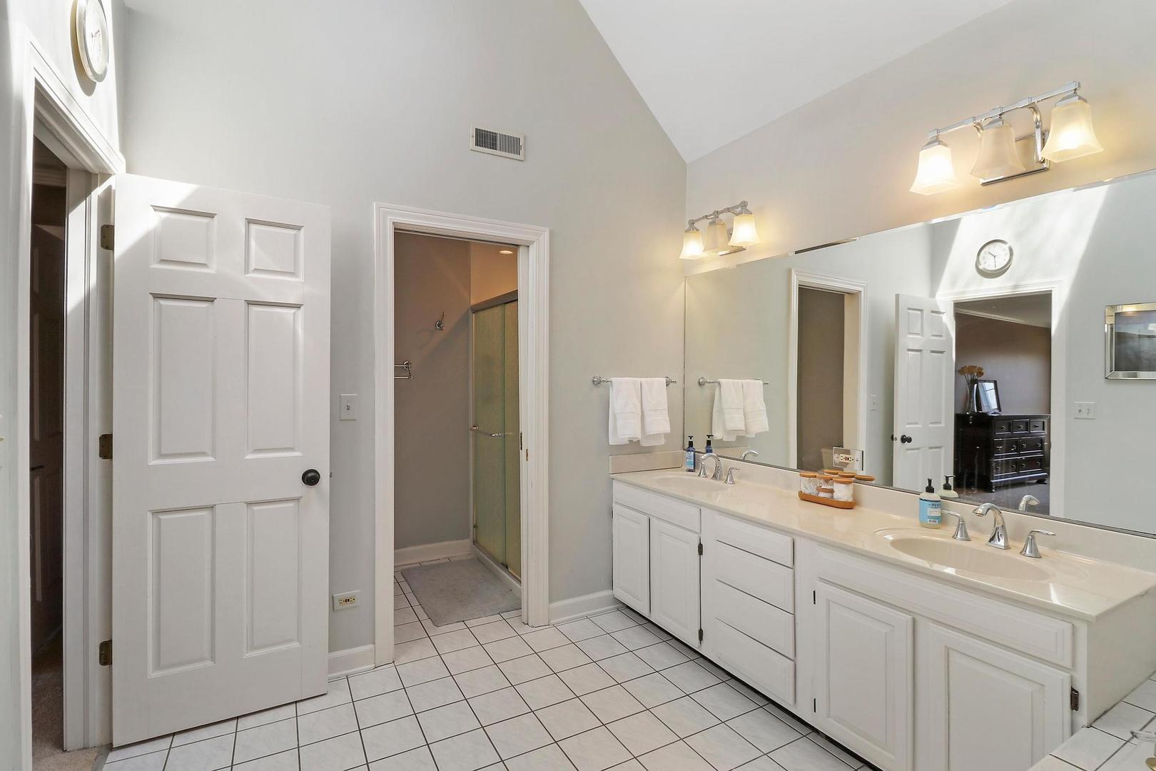 159 Helm Road Barrington Hills, IL 60010 - Photo 35 of 57 a spacious bathroom with a double vanity sink mirror and double