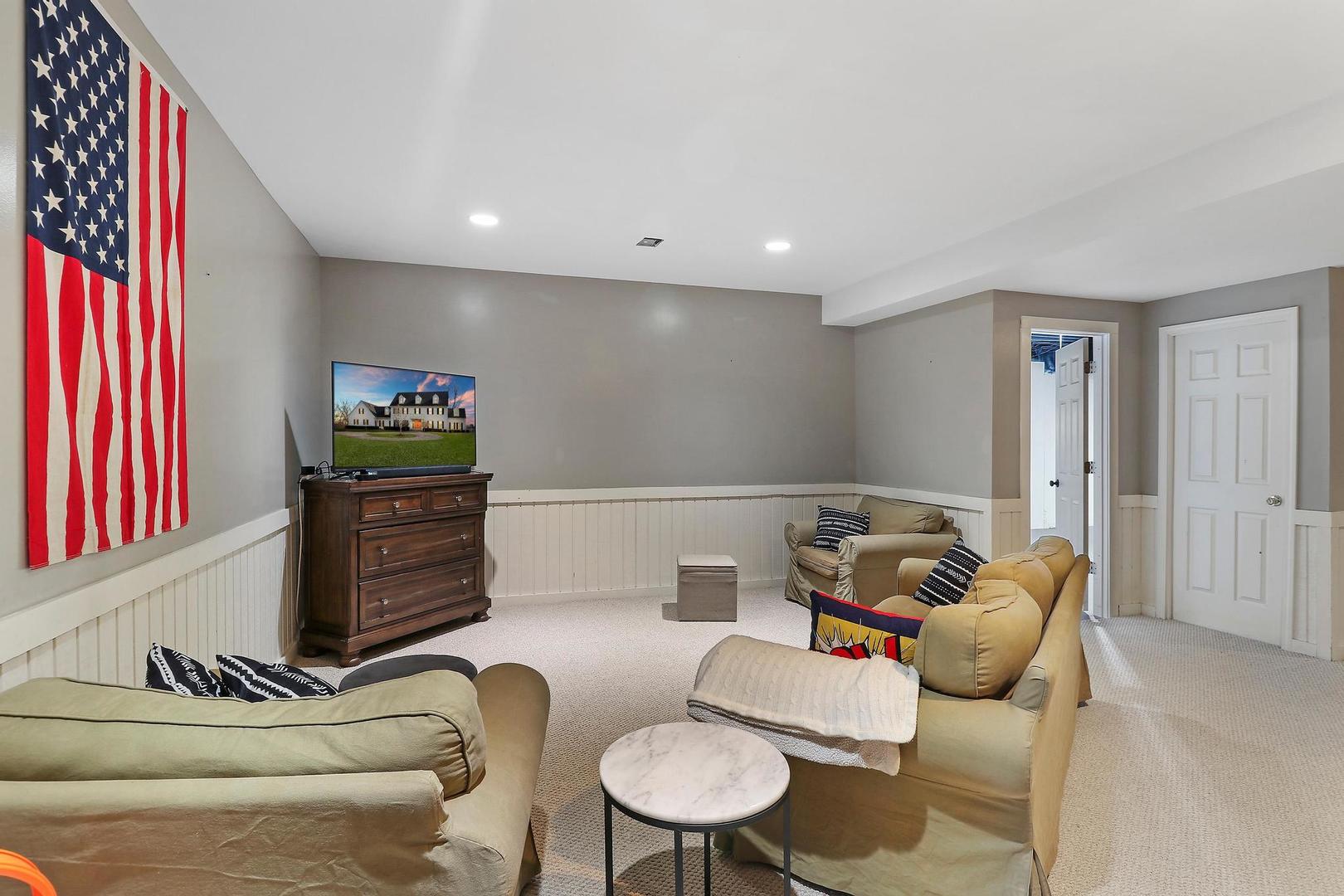 159 Helm Road Barrington Hills, IL 60010 - Photo 43 of 57 a living room with furniture a rug and a window