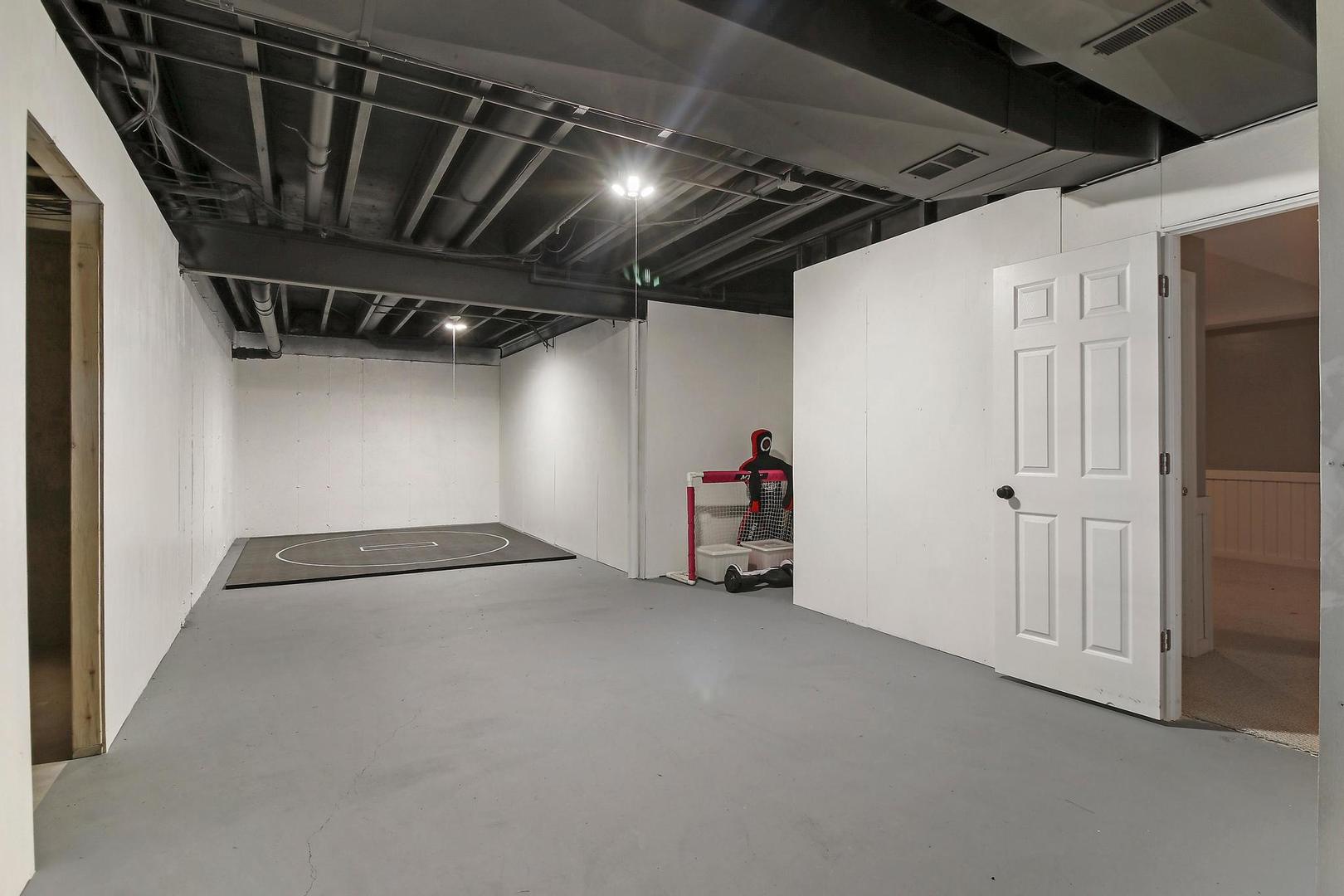 159 Helm Road Barrington Hills, IL 60010 - Photo 45 of 57 a view of a empty room with storage