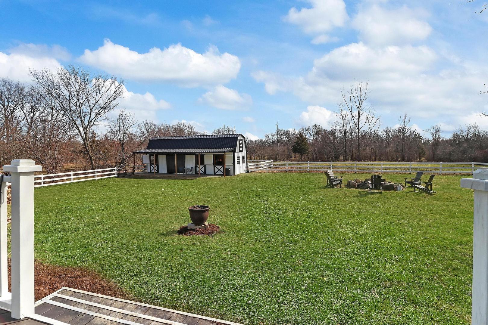 159 Helm Road Barrington Hills, IL 60010 - Photo 50 of 57 a front view of a house with a yard