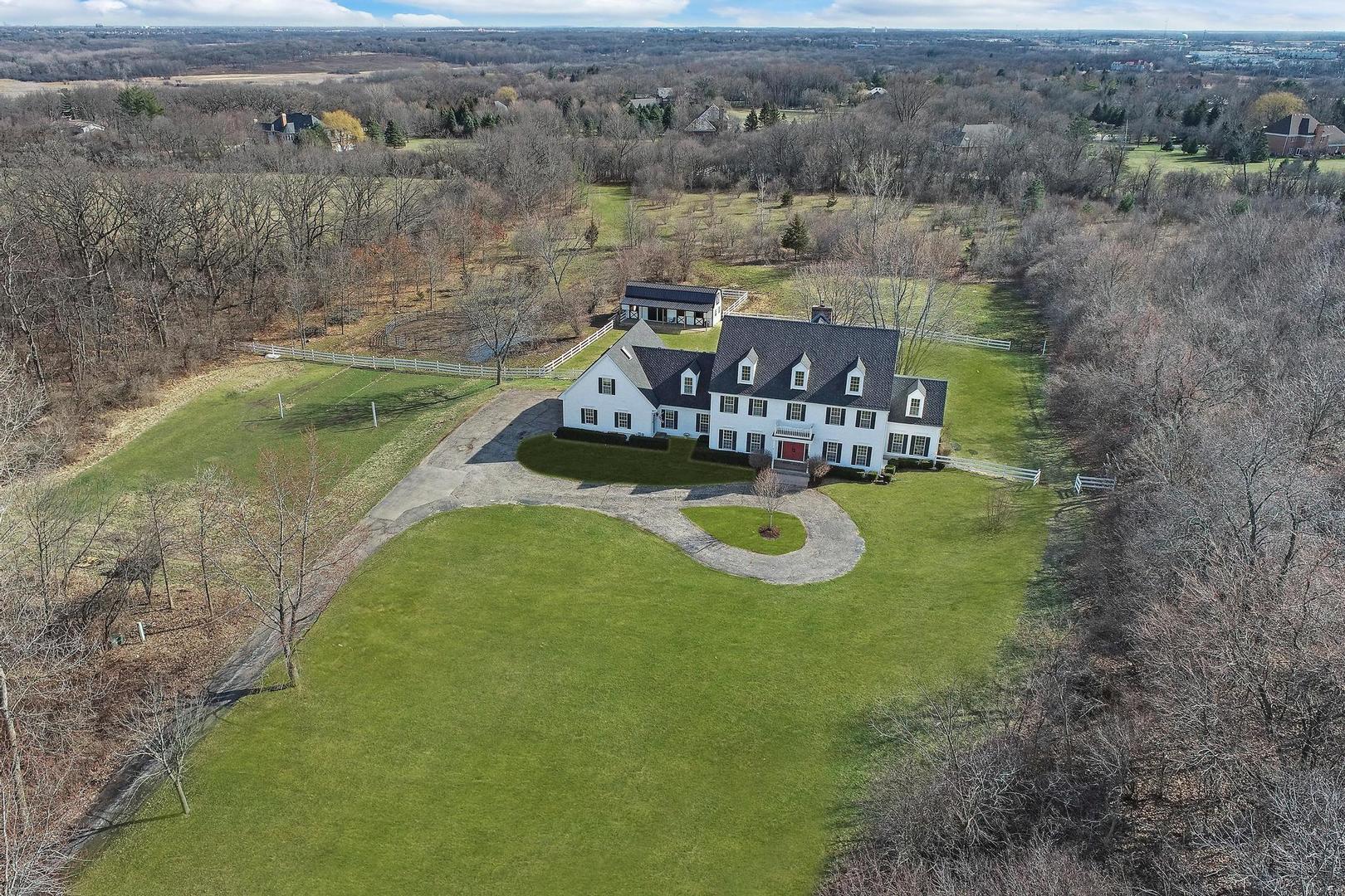 159 Helm Road Barrington Hills, IL 60010 - Photo 8 of 57 an aerial view of a house with a swimming pool
