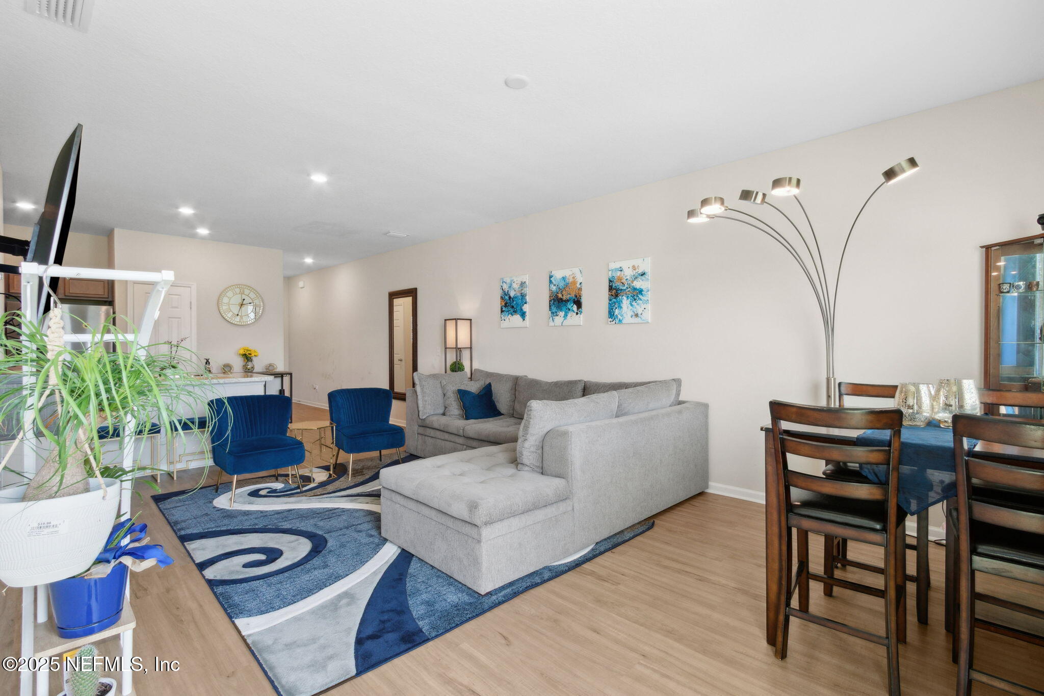 7940 Merchants Way Jacksonville, FL 32222 - Photo 12 of 51 a living room with furniture and wooden floor