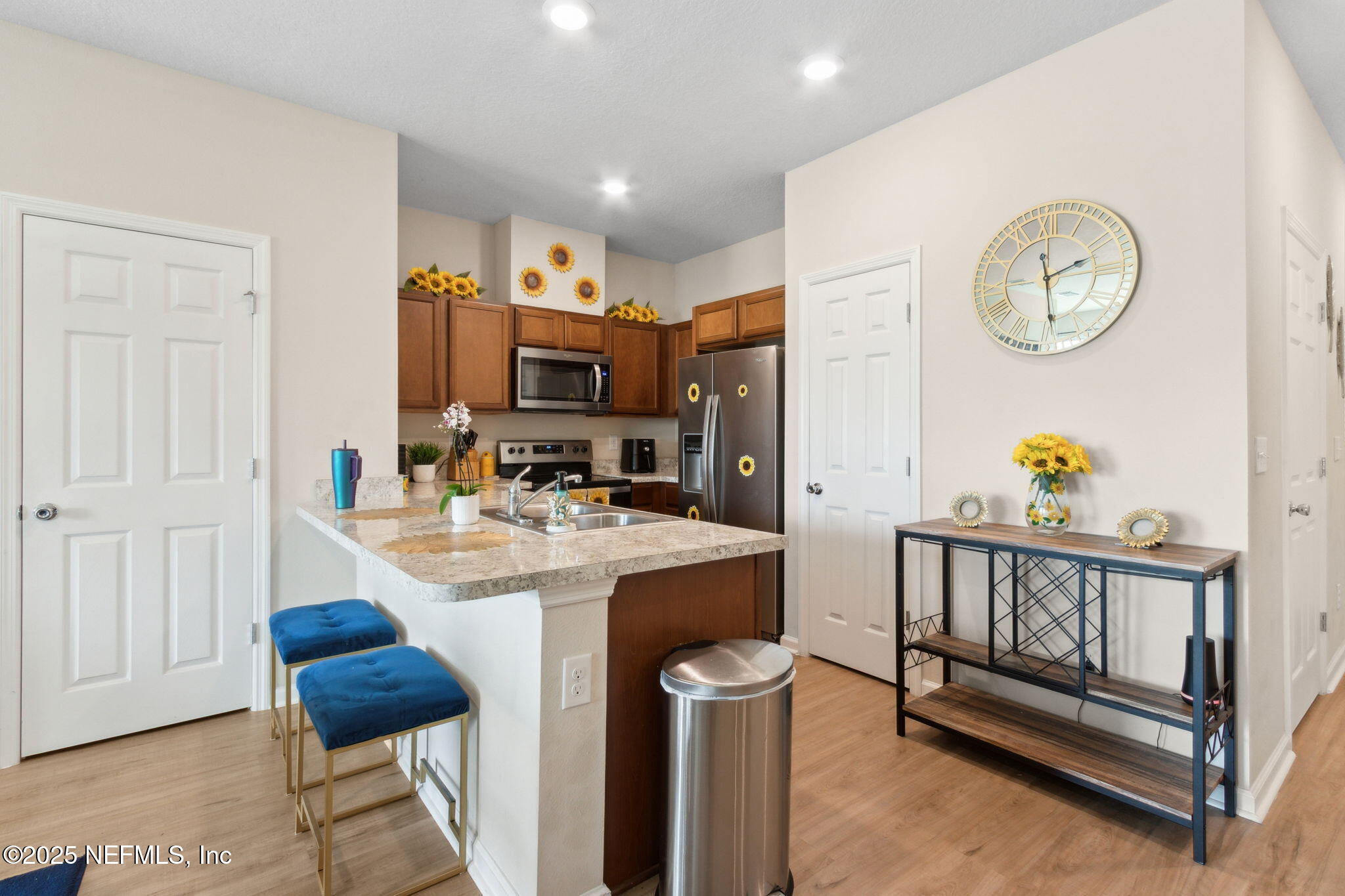 7940 Merchants Way Jacksonville, FL 32222 - Photo 19 of 51 a view of kitchen with furniture and a refrigerator