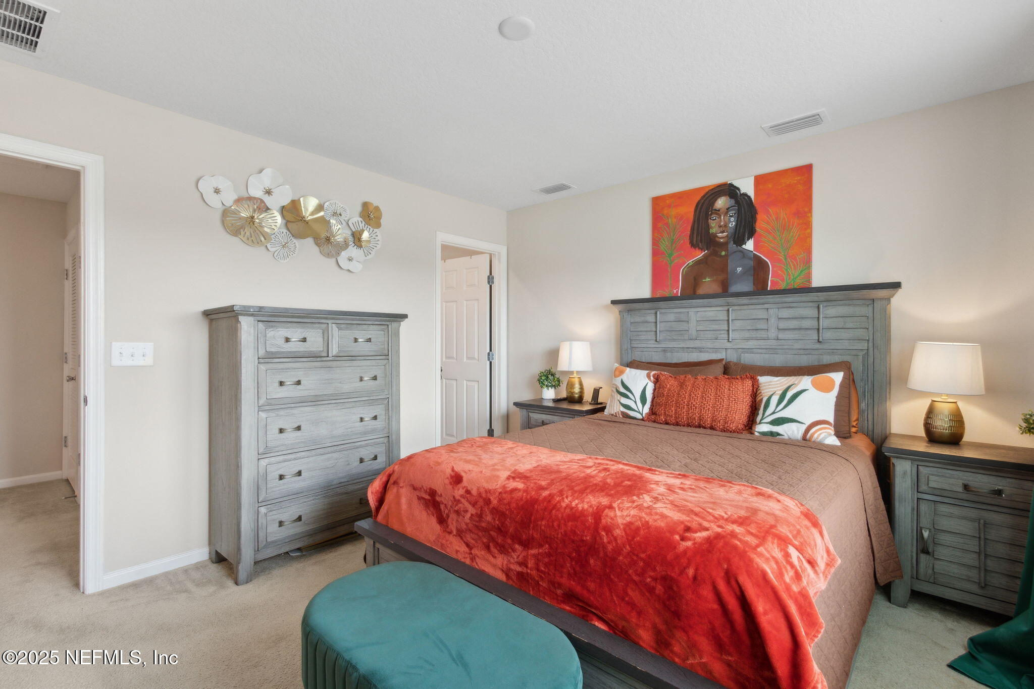 7940 Merchants Way Jacksonville, FL 32222 - Photo 24 of 51 a bedroom with a bed and a painting on the wall