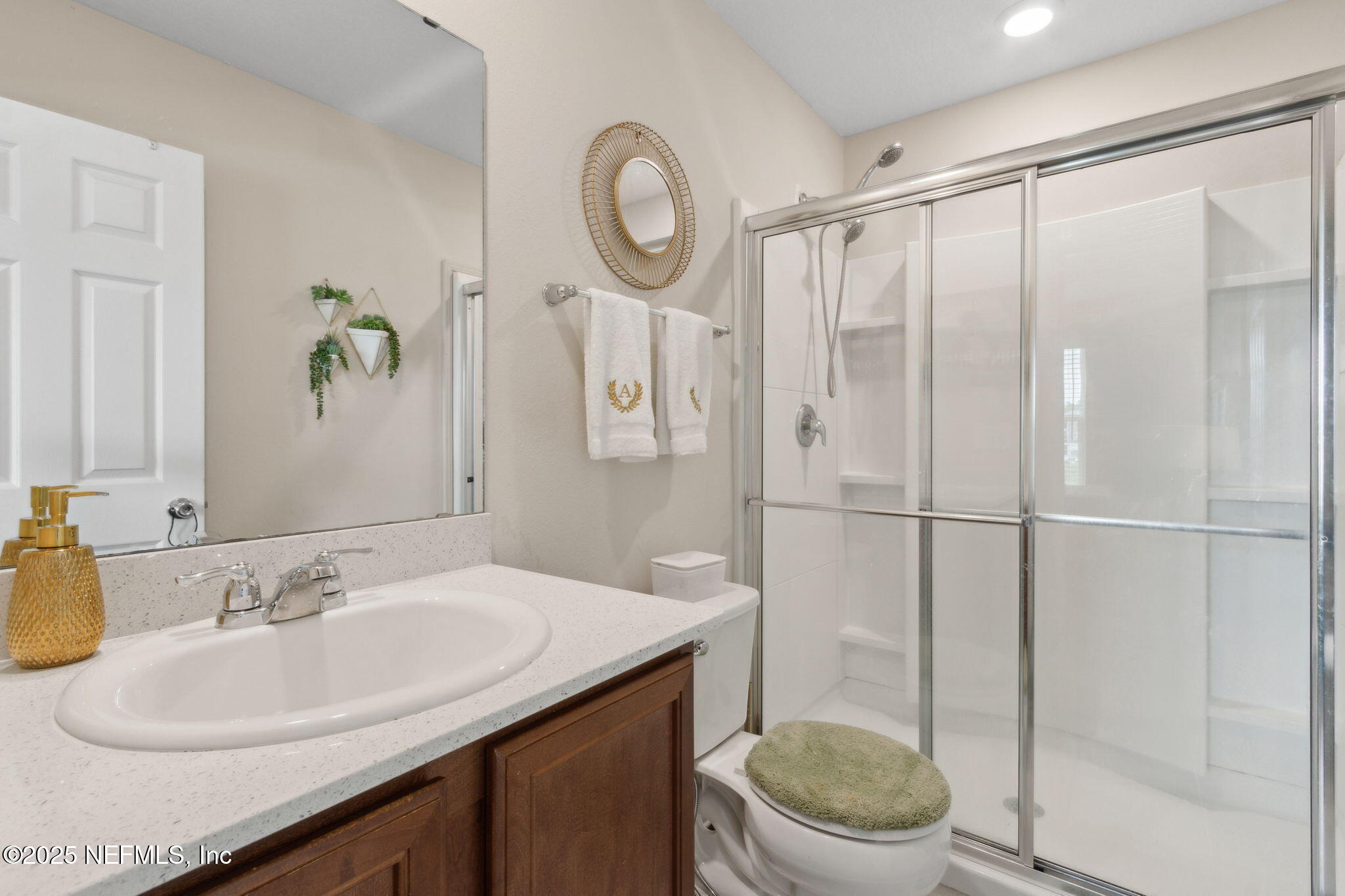 7940 Merchants Way Jacksonville, FL 32222 - Photo 26 of 51 a bathroom with a sink a toilet and a shower