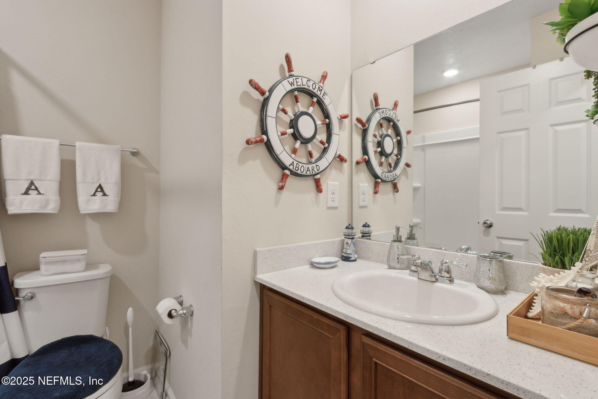 7940 Merchants Way Jacksonville, FL 32222 - Photo 30 of 51 a bathroom with a sink and a toilet