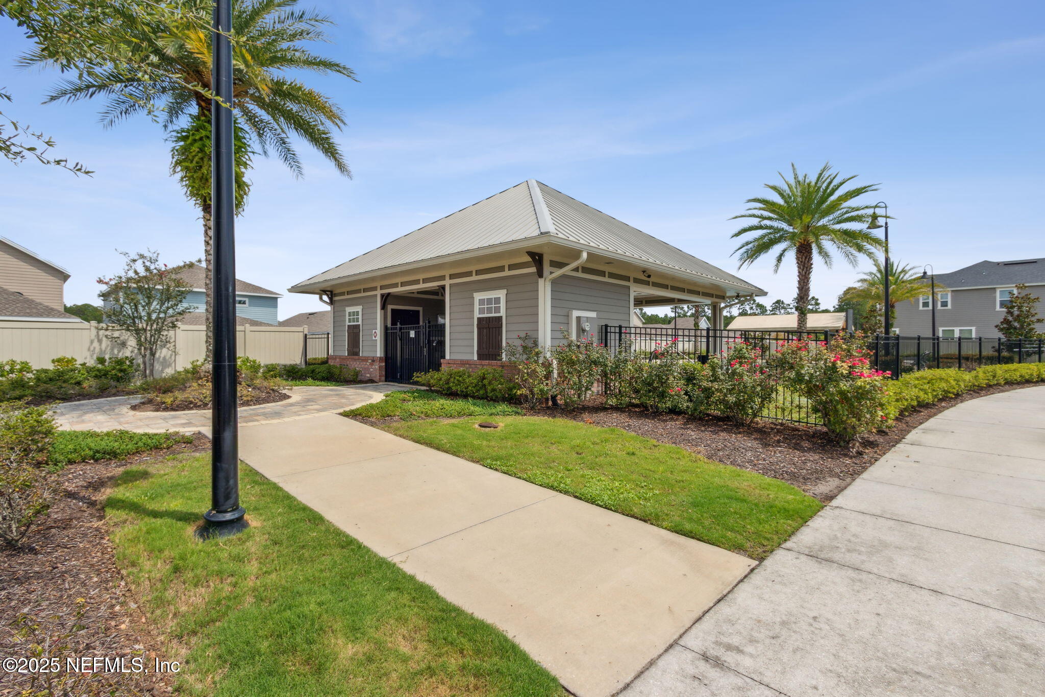 7940 Merchants Way Jacksonville, FL 32222 - Photo 42 of 51 a front view of house with yard and green space