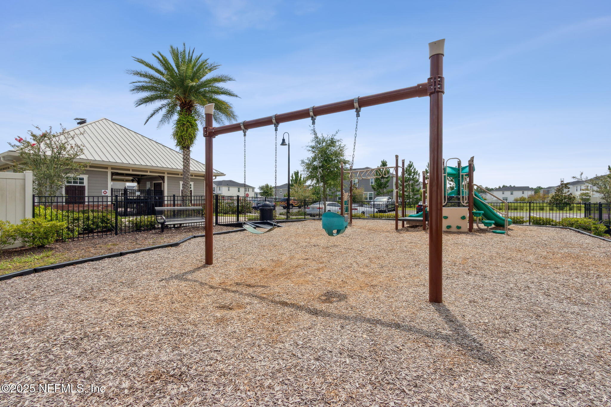 7940 Merchants Way Jacksonville, FL 32222 - Photo 45 of 51 a view of a palm tree next to a yard