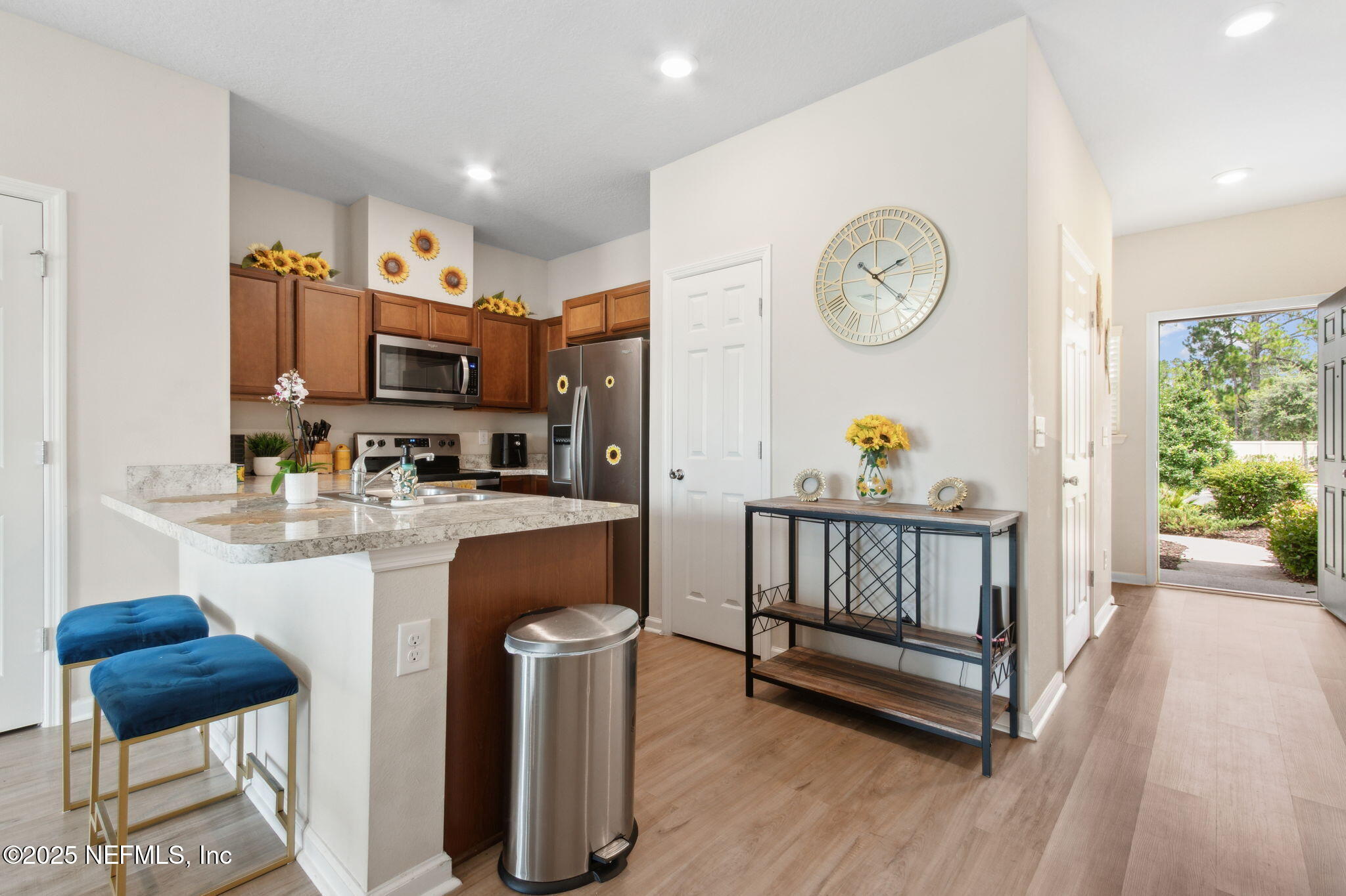 7940 Merchants Way Jacksonville, FL 32222 - Photo 9 of 51 a kitchen with refrigerator and window