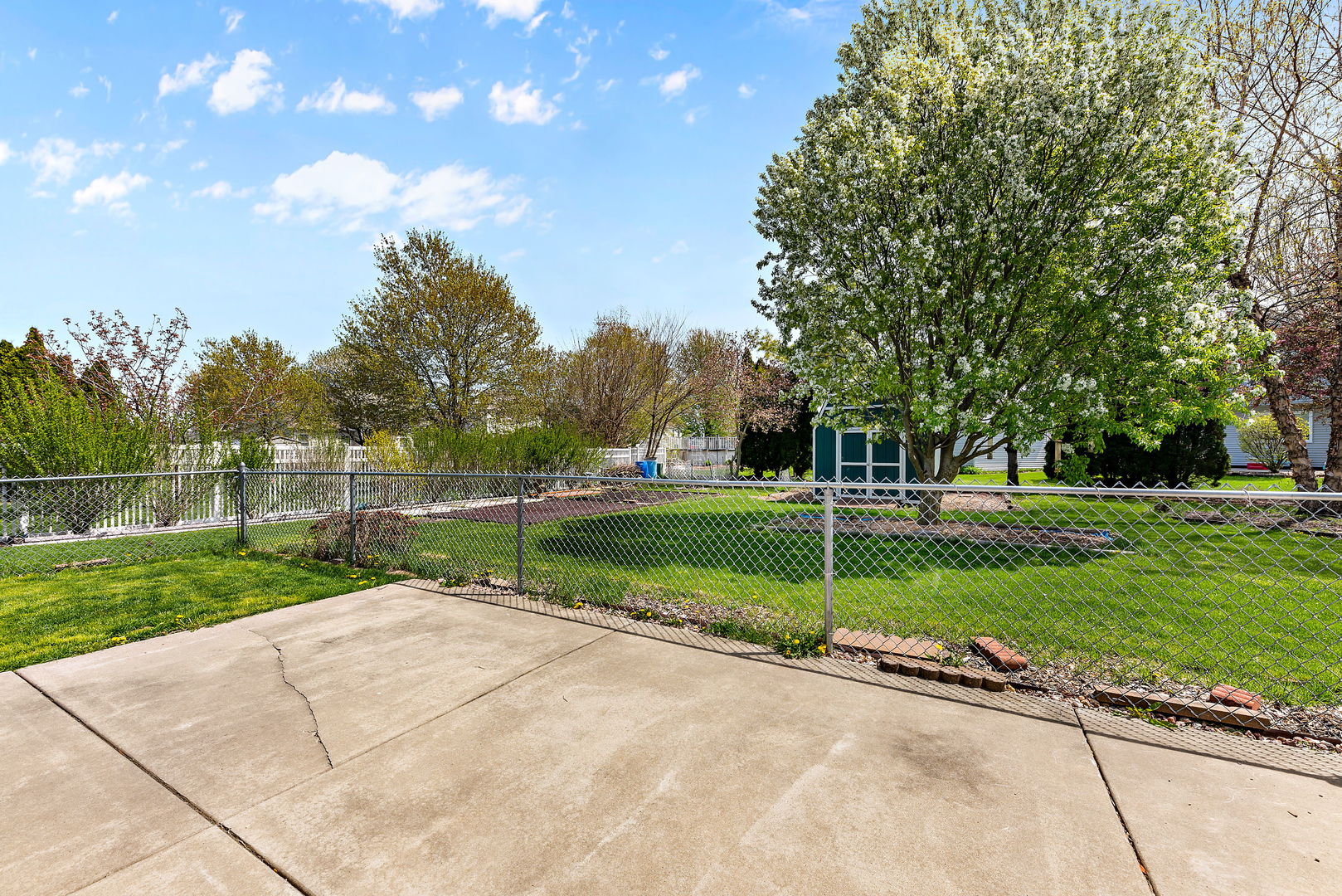372 Jefferson Street Manteno, IL 60950 - Photo 20 of 24 a view of a park with large trees
