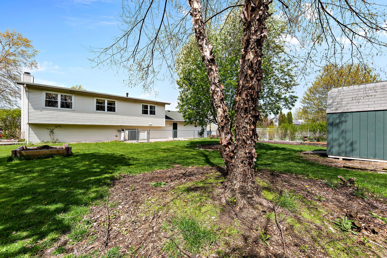 372 Jefferson Street Manteno, IL 60950 - Photo 22 of 24 a front view of a house with garden