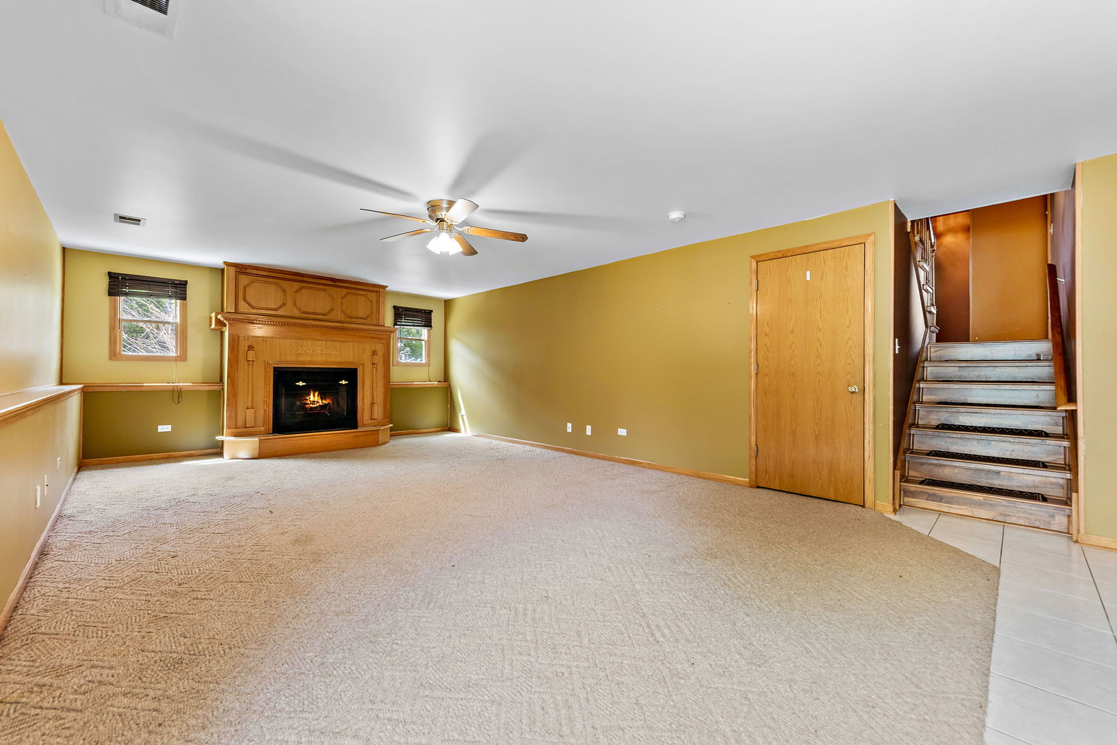 372 Jefferson Street Manteno, IL 60950 - Photo 9 of 24 a view of an empty room with a fireplace