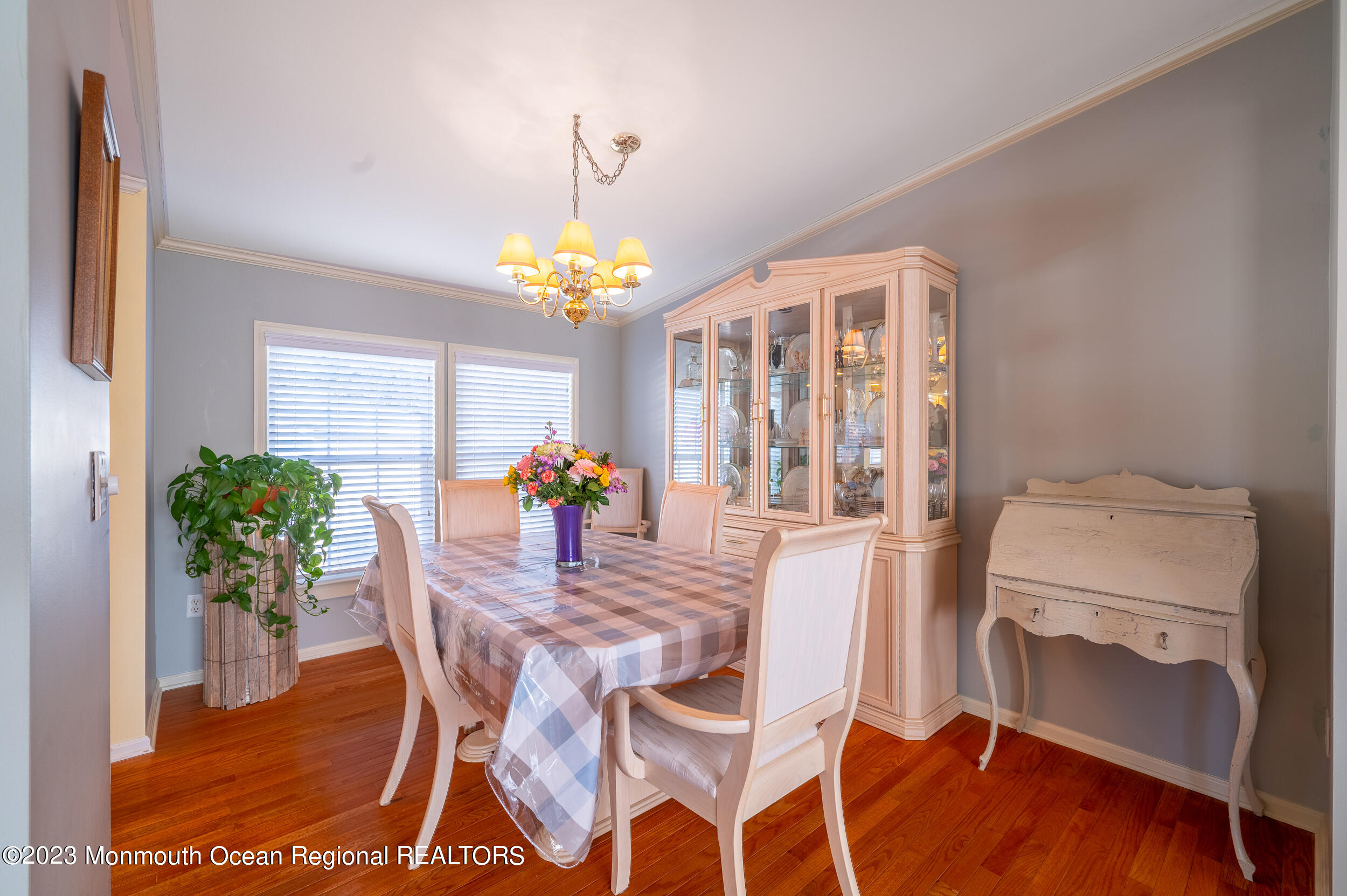 1410 Forest Way Whiting, NJ 08759 - Photo 13 of 34 a dining room with furniture and chandelier