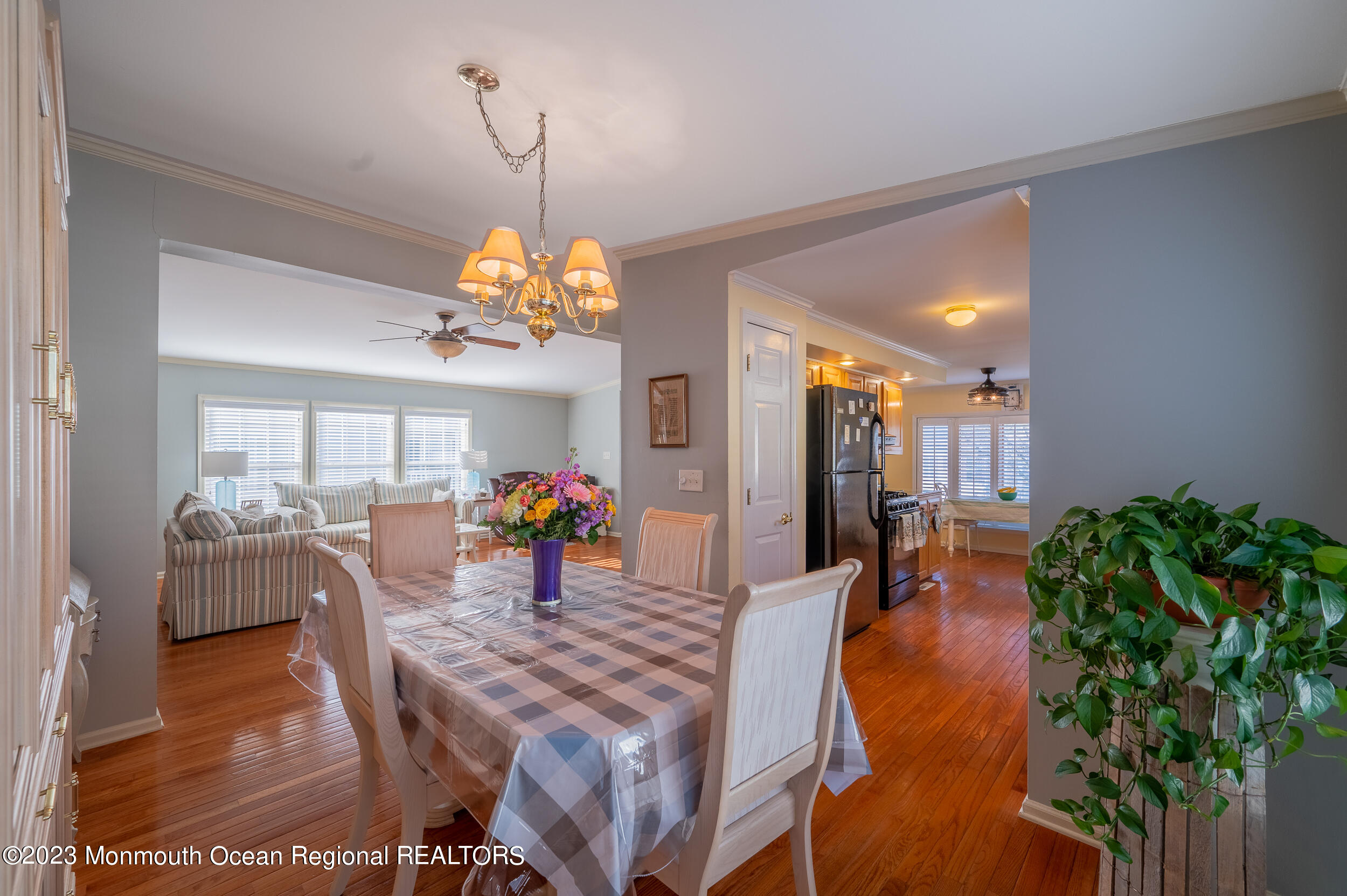 1410 Forest Way Whiting, NJ 08759 - Photo 15 of 34 a view of a dining room with furniture and chandelier
