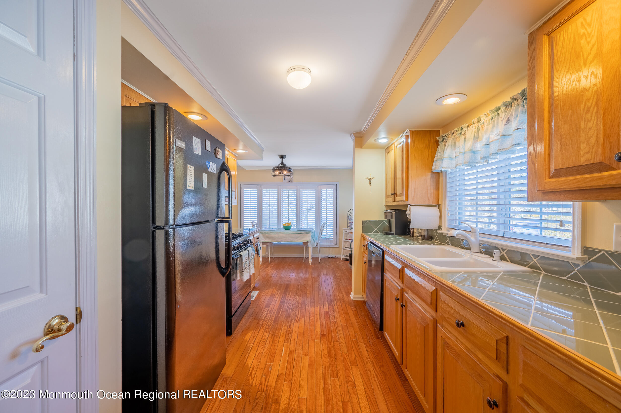 1410 Forest Way Whiting, NJ 08759 - Photo 17 of 34 a kitchen with granite countertop a sink a counter top space and stainless steel appliances