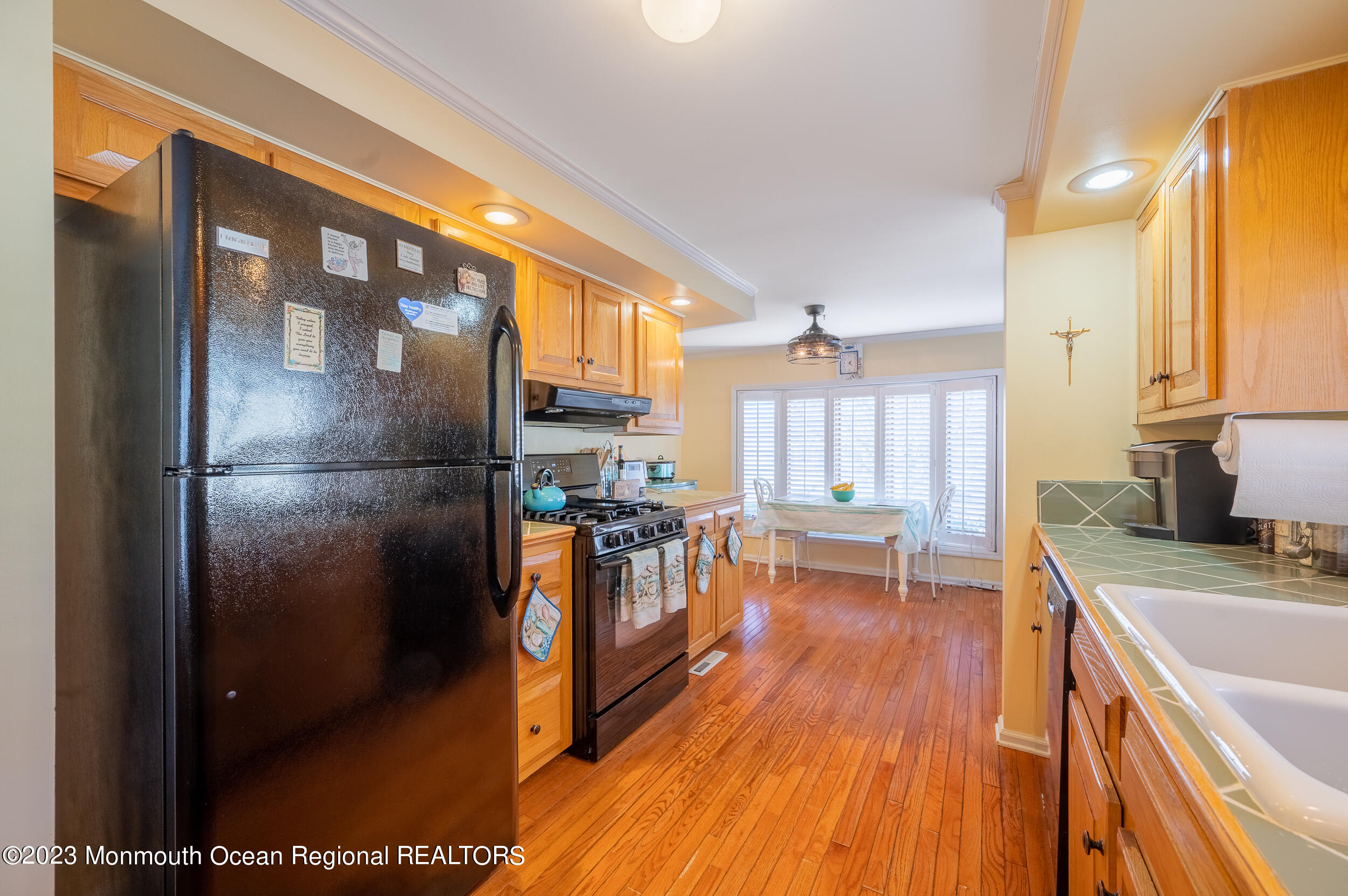 1410 Forest Way Whiting, NJ 08759 - Photo 20 of 34 a kitchen view with a refrigerator and a sink