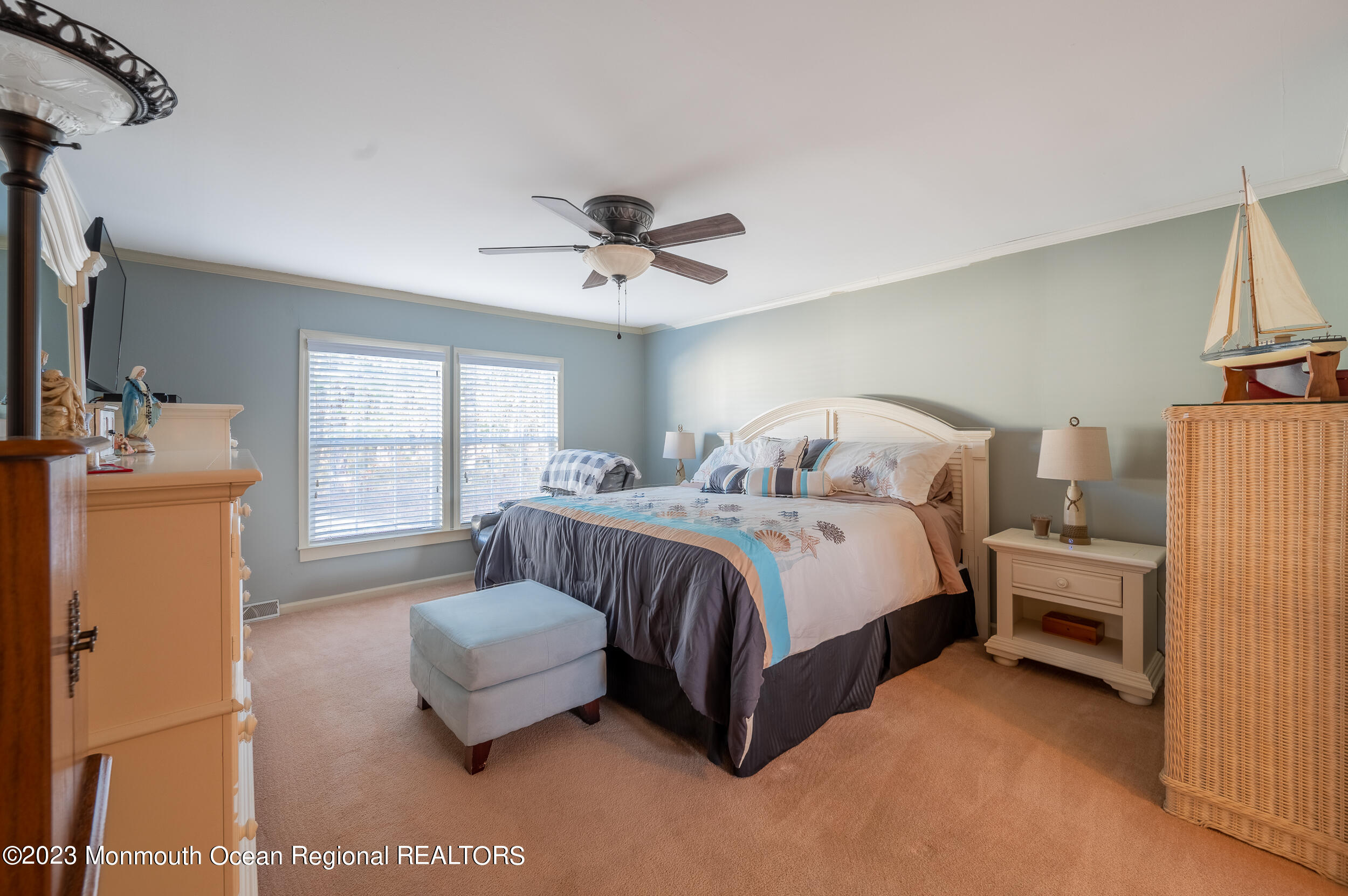 1410 Forest Way Whiting, NJ 08759 - Photo 24 of 34 a spacious bedroom with a bed and a couch