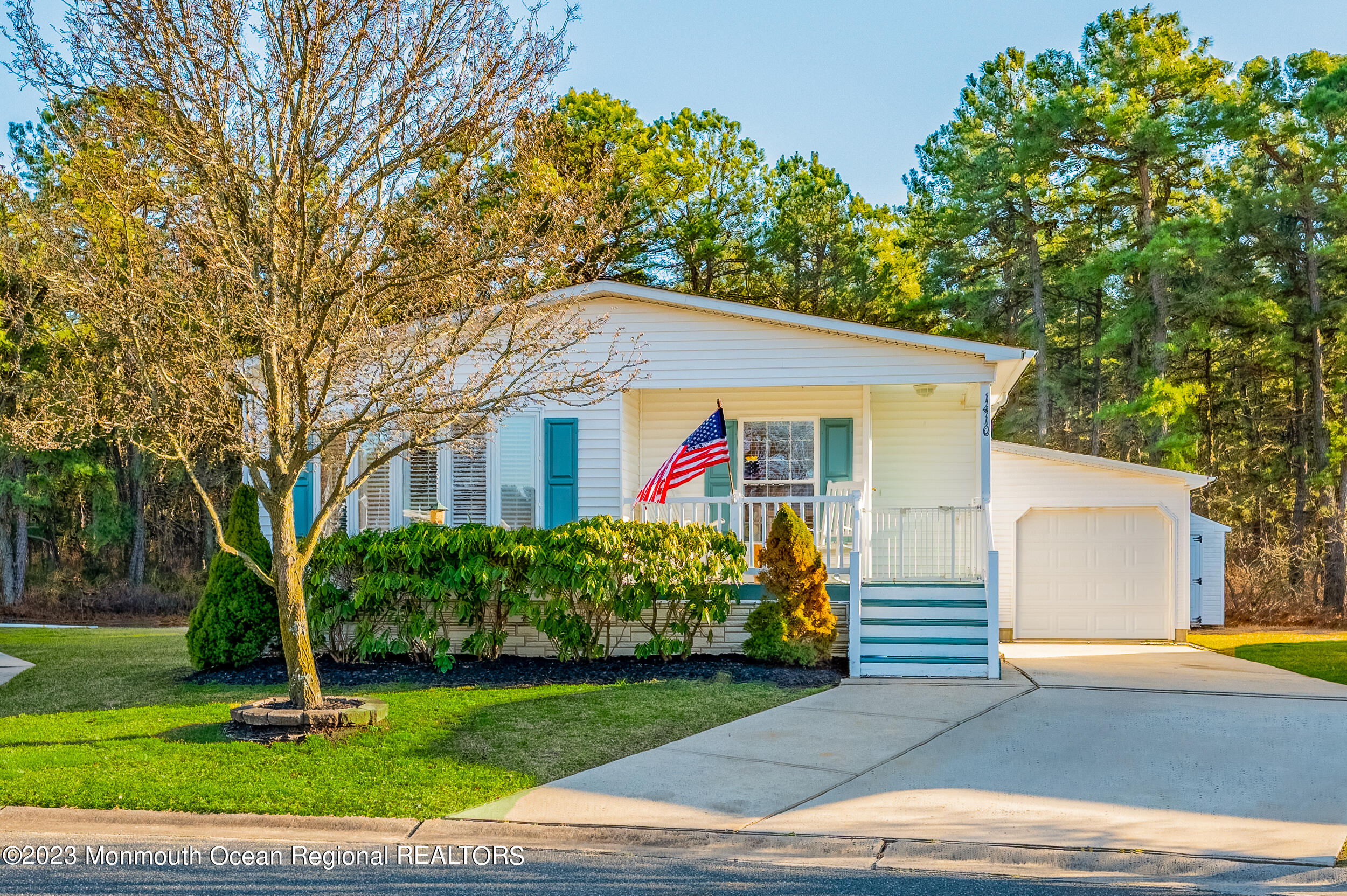 1410 Forest Way Whiting, NJ 08759 - Photo 3 of 34 a front view of a house with garden