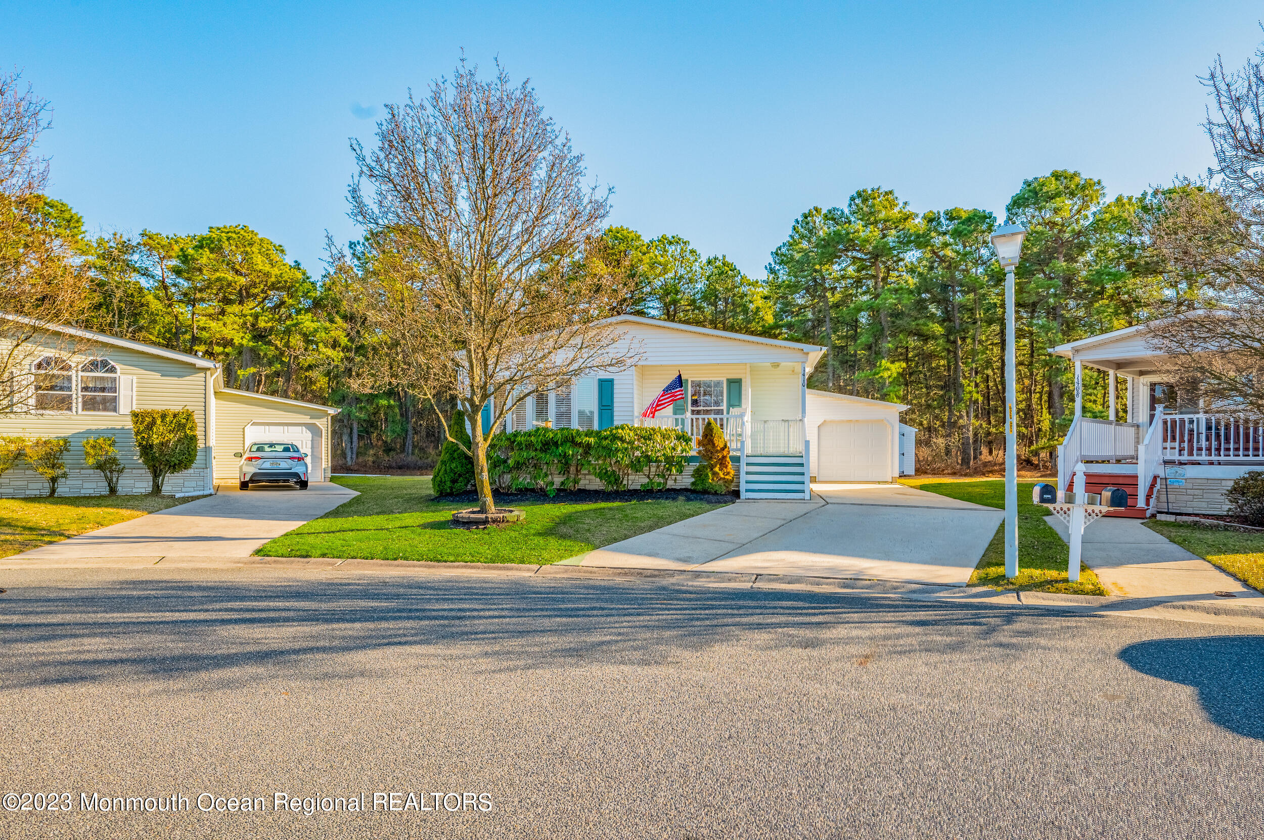 1410 Forest Way Whiting, NJ 08759 - Photo 5 of 34 a view of road with palm trees