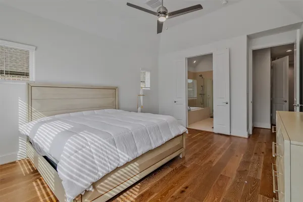 a bedroom with a bed and closet