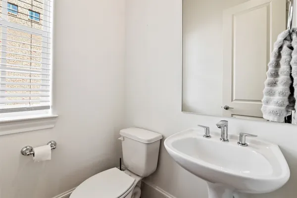a bathroom with a sink and a toilet