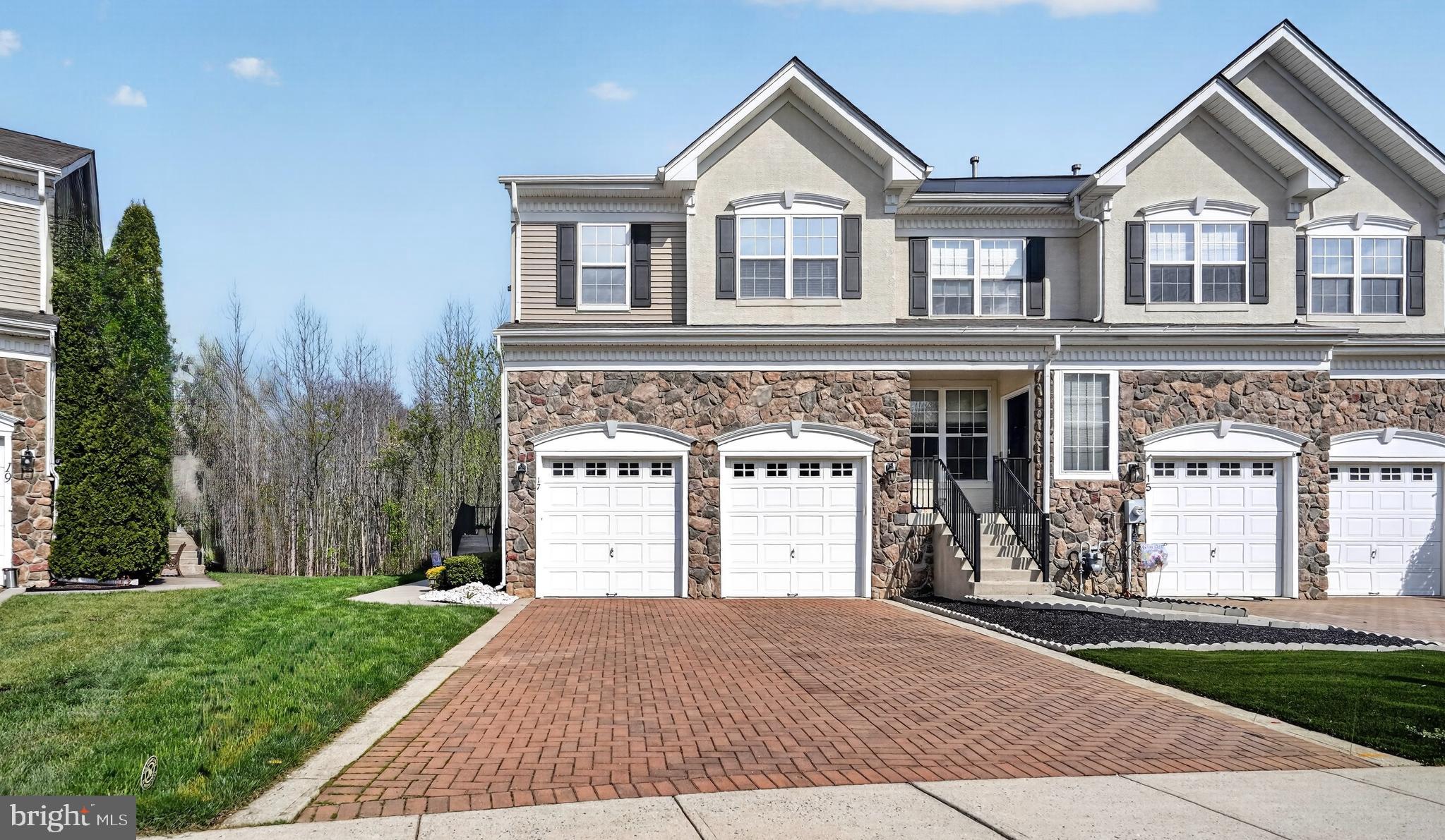 17 Welsford Way Westampton, NJ 08060 - Photo 1 of 41 a front view of a house with a yard and garage