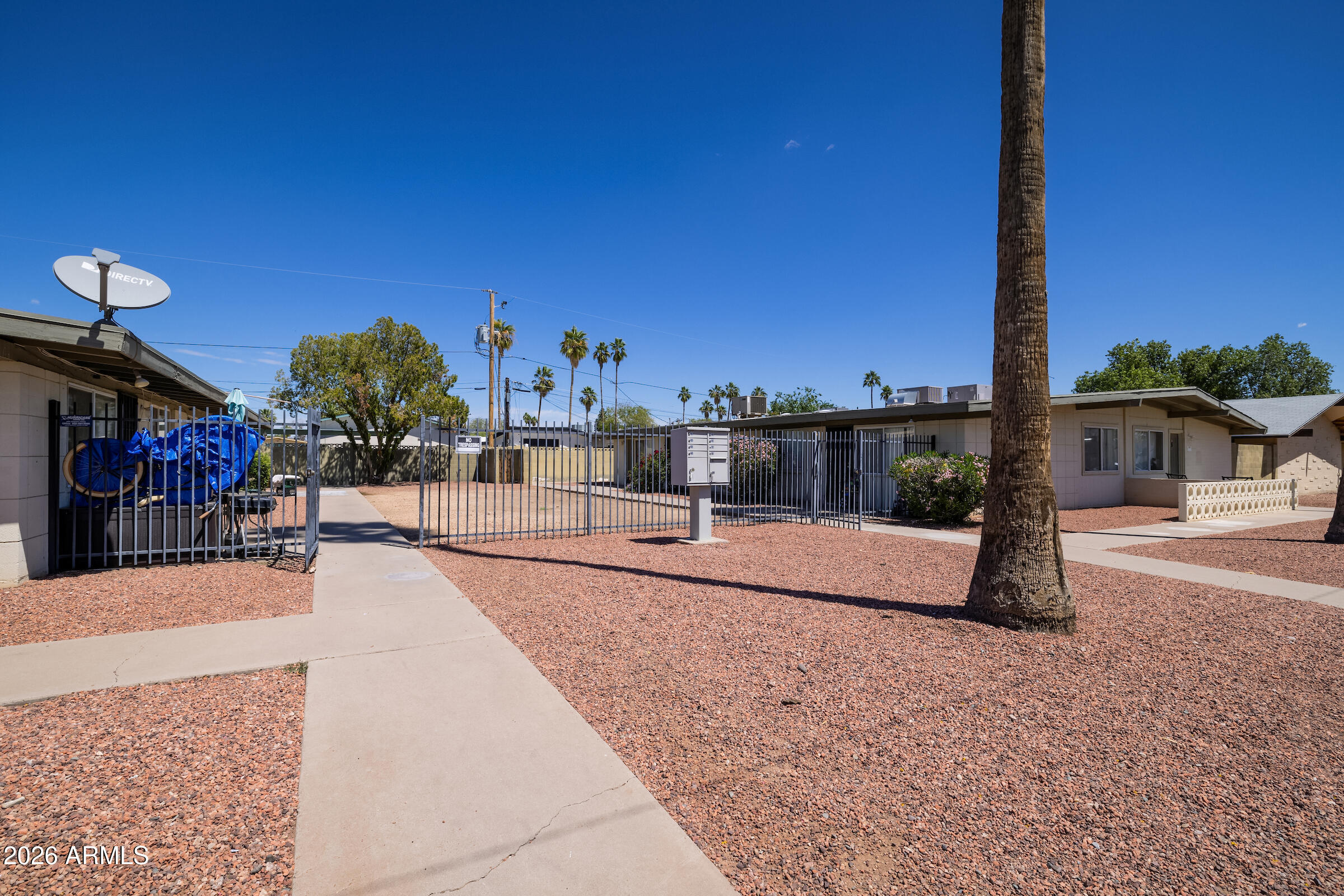 6644 East Cheery Lynn Road Scottsdale, AZ 85251 - Photo 4 of 10 a view of a street with a building in the background