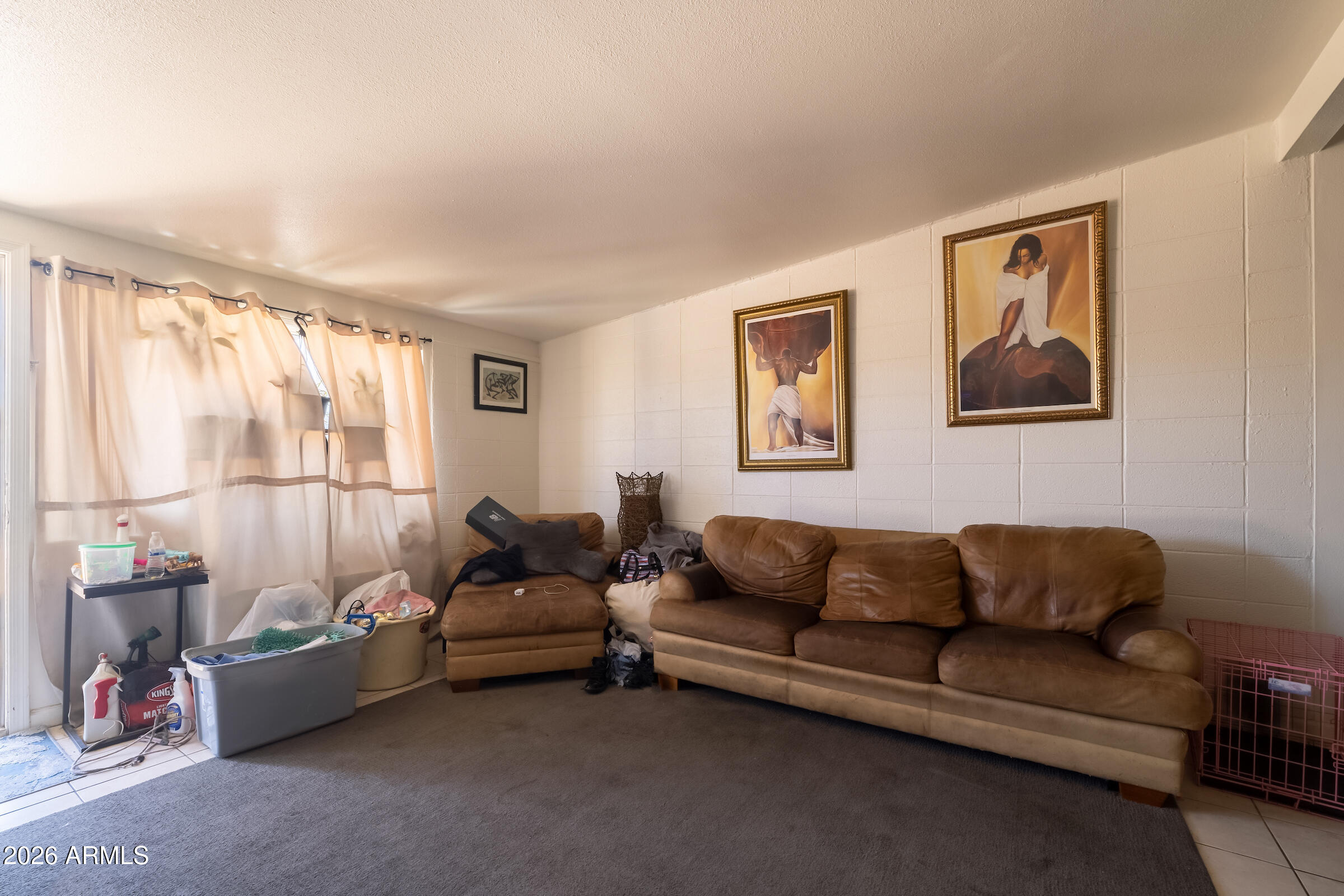 6644 East Cheery Lynn Road Scottsdale, AZ 85251 - Photo 7 of 10 a living room with furniture and a window