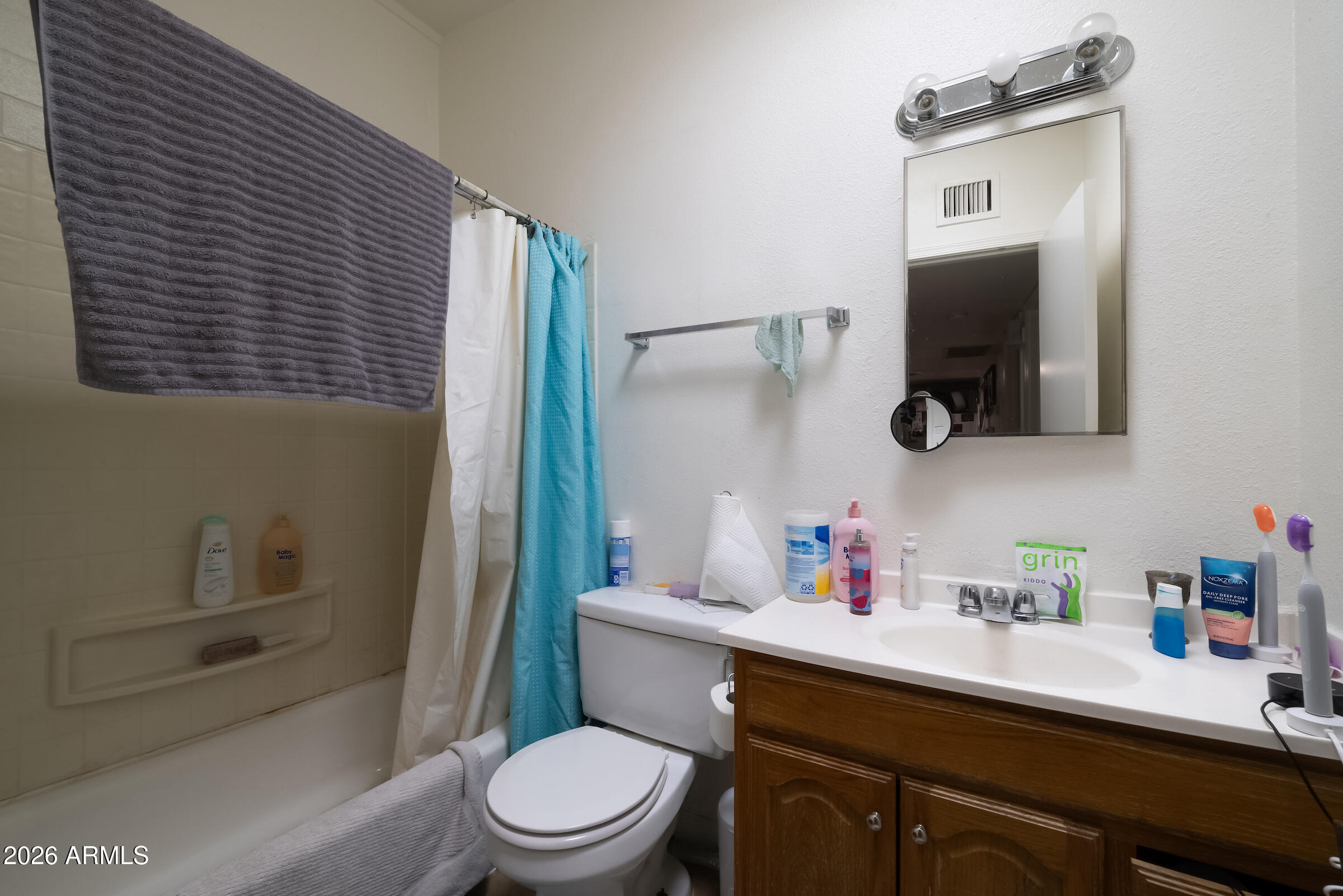 6644 East Cheery Lynn Road Scottsdale, AZ 85251 - Photo 9 of 10 a bathroom with a sink a toilet and shower