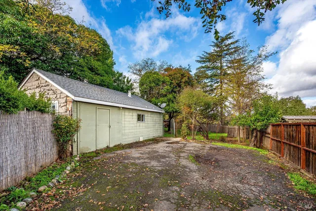 a view of backyard with green space