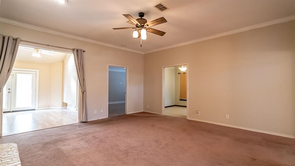 4018 View Point Drive Granbury, TX 76048 - Photo 11 of 38 Living room looking into sunroom
