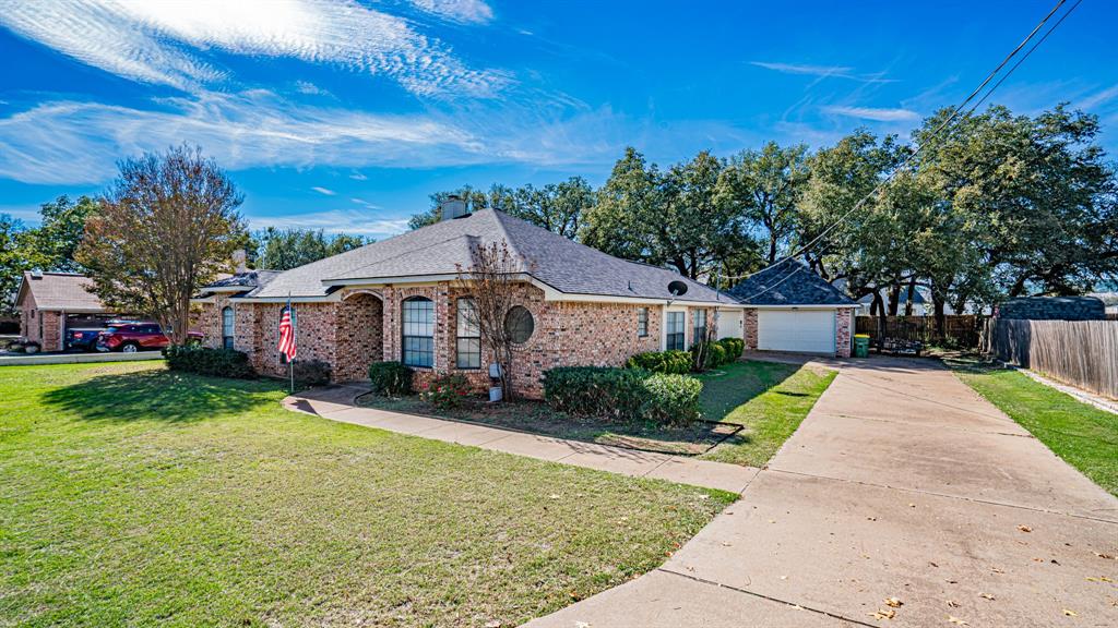 4018 View Point Drive Granbury, TX 76048 - Photo 2 of 38 Great bones with the bonus of a detached second garage