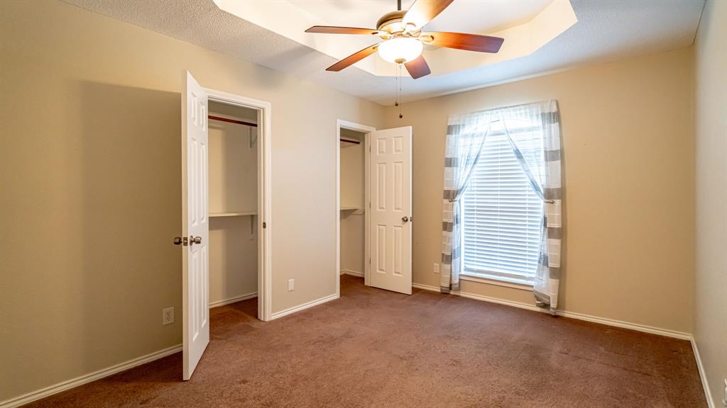 4018 View Point Drive Granbury, TX 76048 - Photo 31 of 38 Bedroom with double door closet