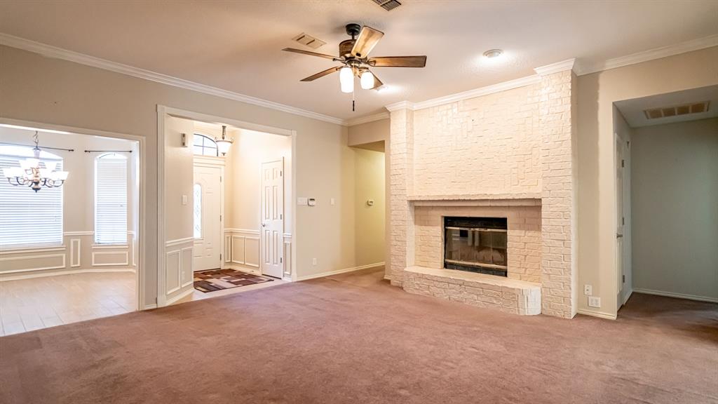 4018 View Point Drive Granbury, TX 76048 - Photo 10 of 38 Living room with view of front door and dining room
