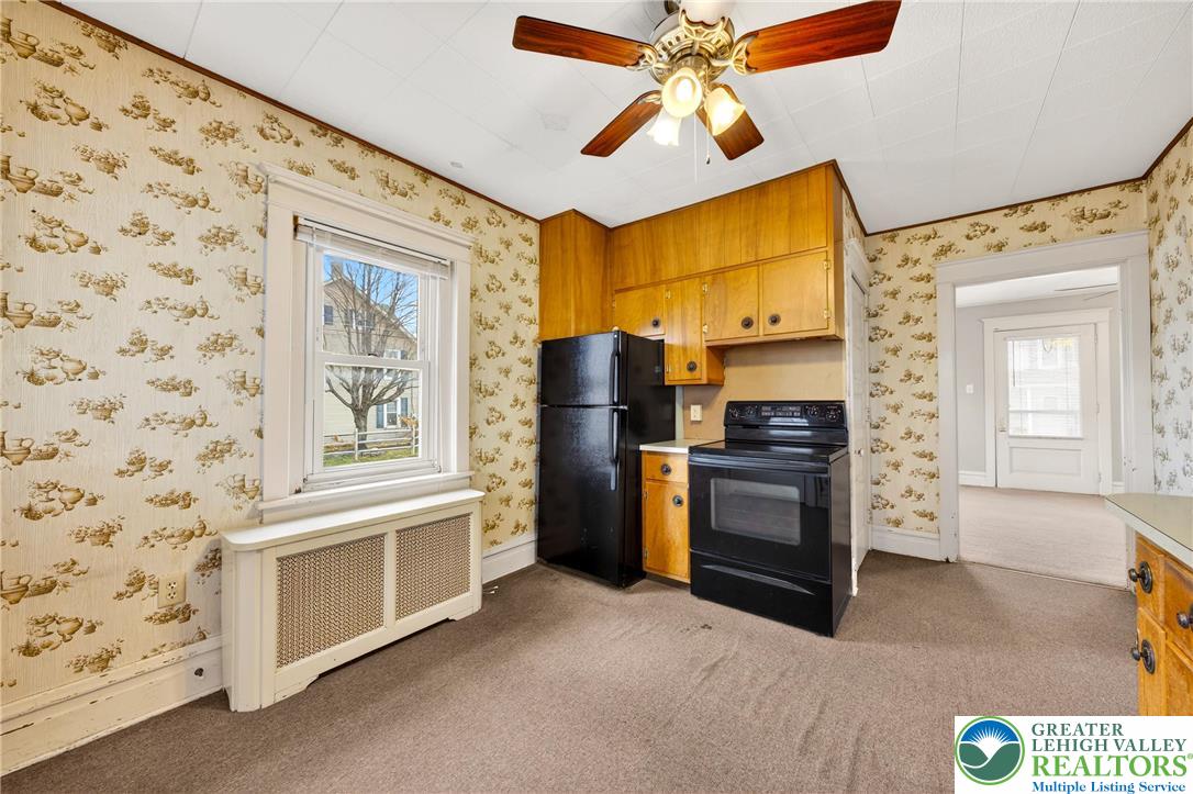 3301 Lehigh Street Whitehall, PA 18052 - Photo 12 of 40 a kitchen with cabinets and wooden floor