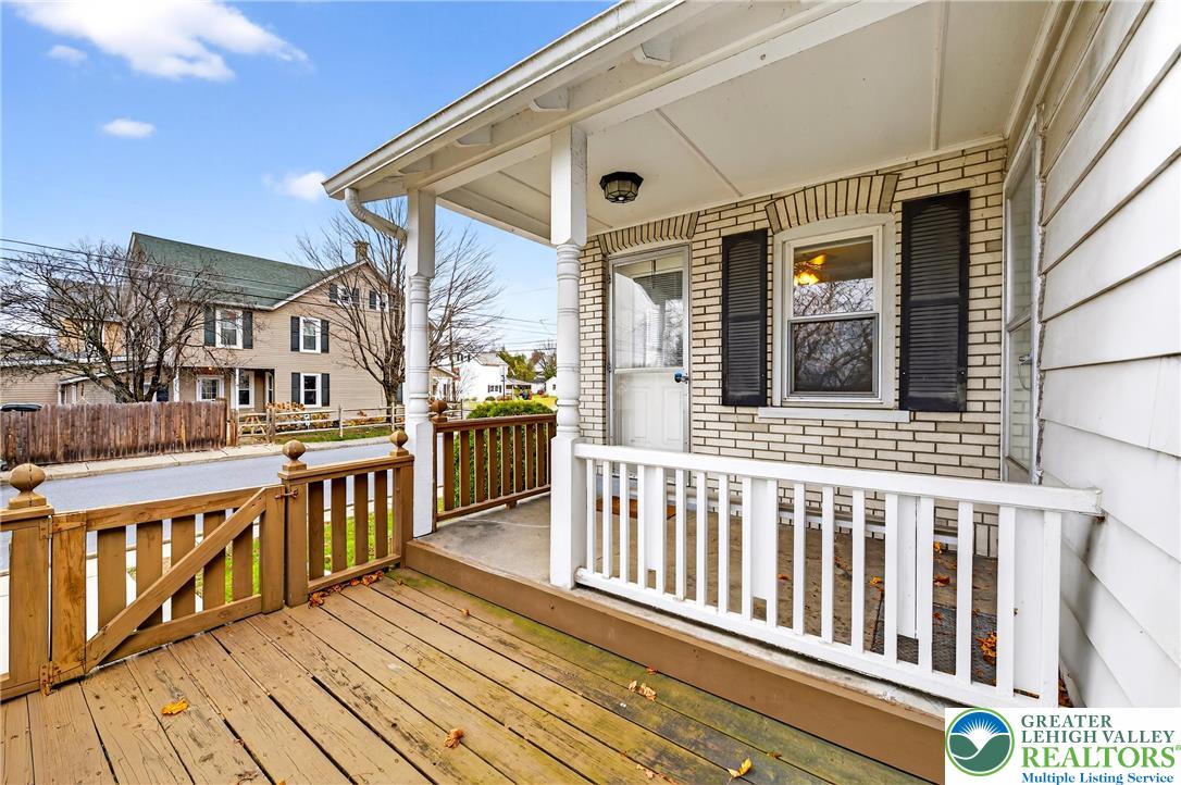 3301 Lehigh Street Whitehall, PA 18052 - Photo 35 of 40 a view of a brick house with large windows and wooden floor
