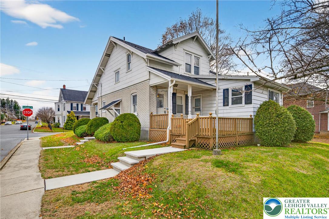 3301 Lehigh Street Whitehall, PA 18052 - Photo 37 of 40 a view of a house with backyard and a tree