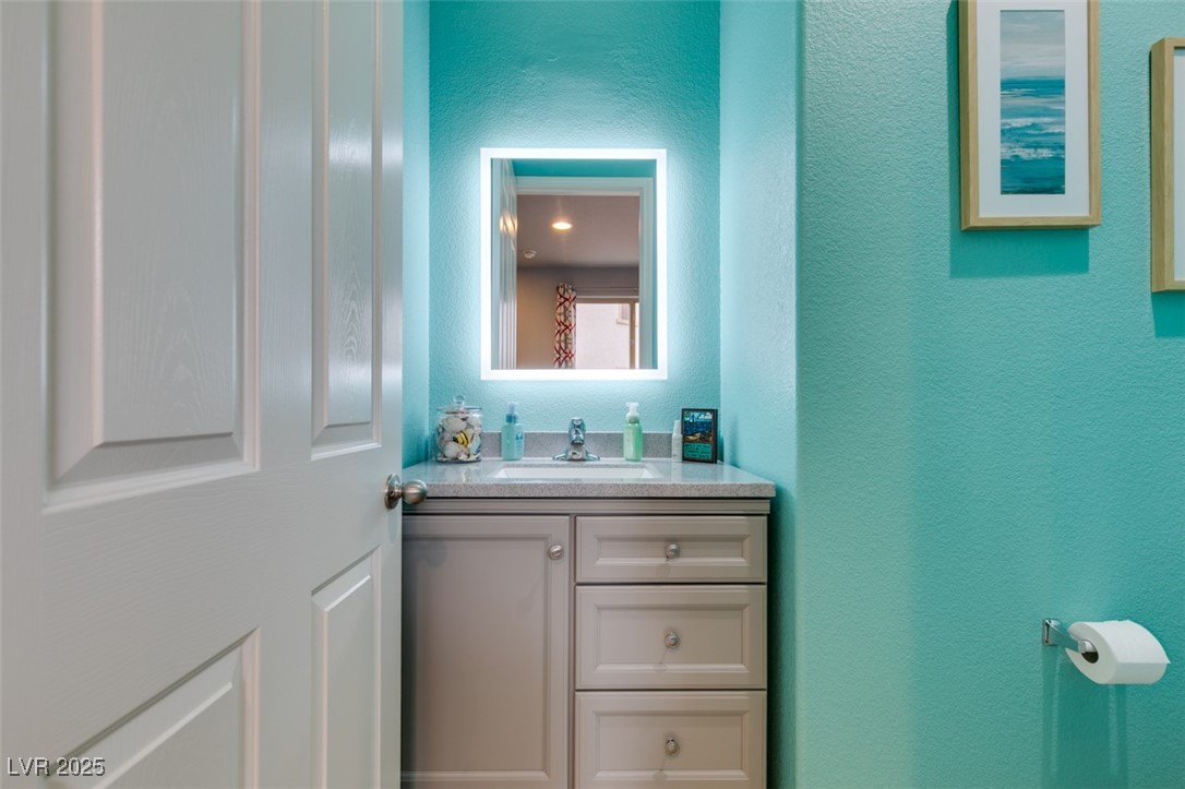 230 Sweet Spot Street Henderson, NV 89074 - Photo 20 of 38 Downstairs Half-Bath near entry.