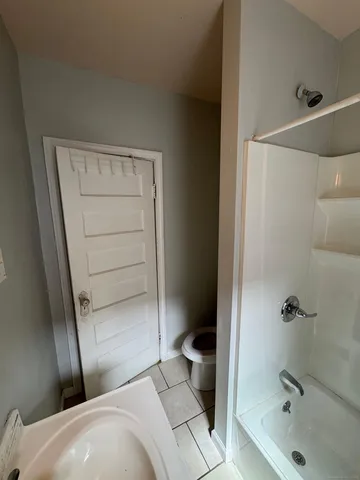 a bathroom with a sink and a tub