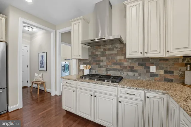 a bathroom with a sink a mirror and a toilet