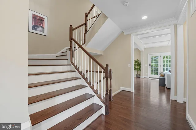 a bed room with a bed and a large window
