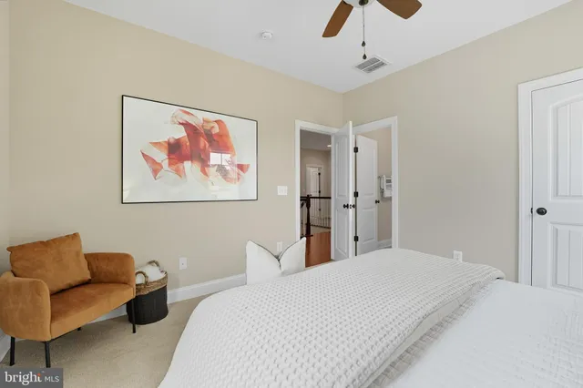 a view of empty room with wooden walls